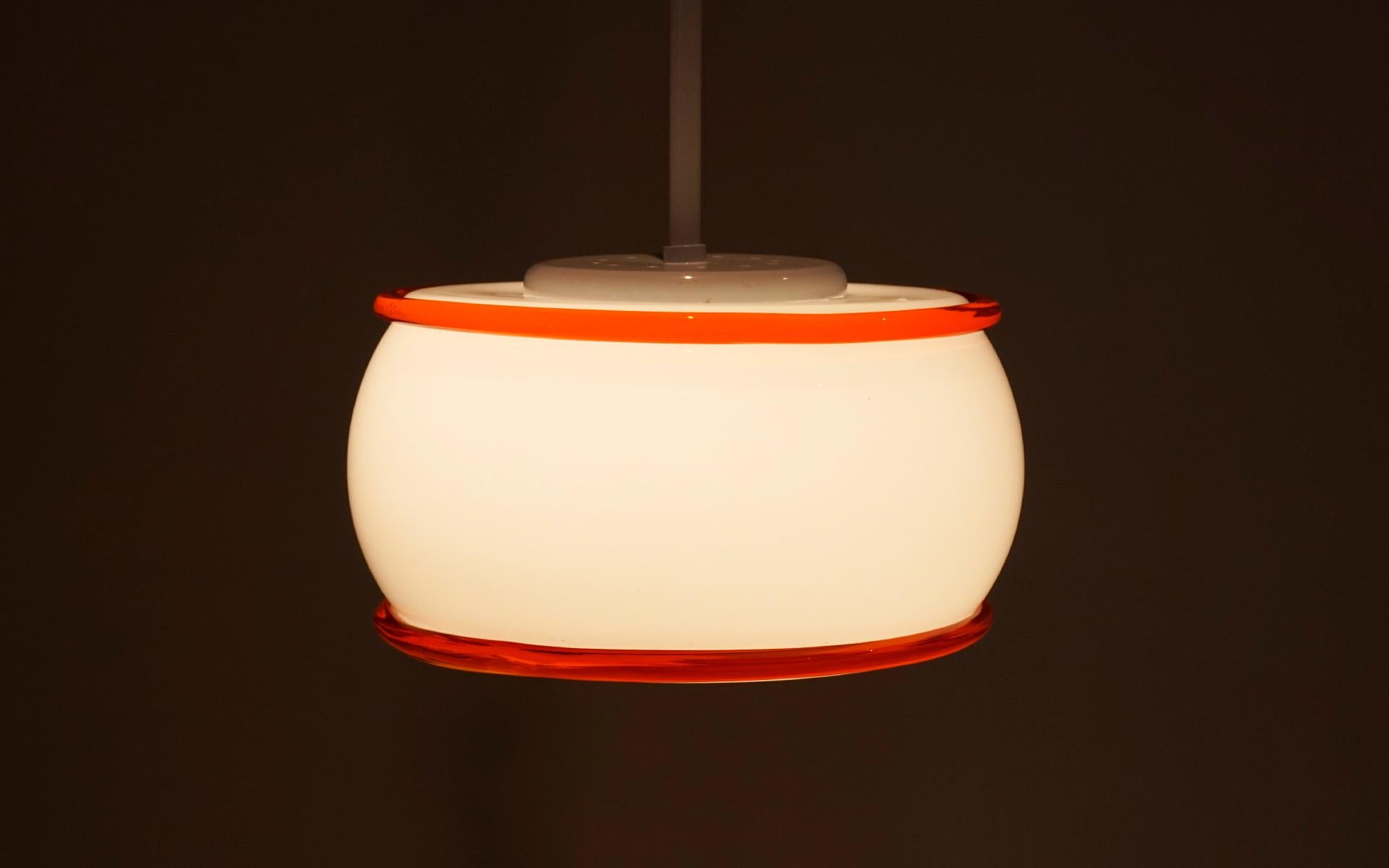 Italian Ettore Sottass Pendant Lamp, Vistosi, Italy, 1974. White Red-Orange Glass. Signed For Sale
