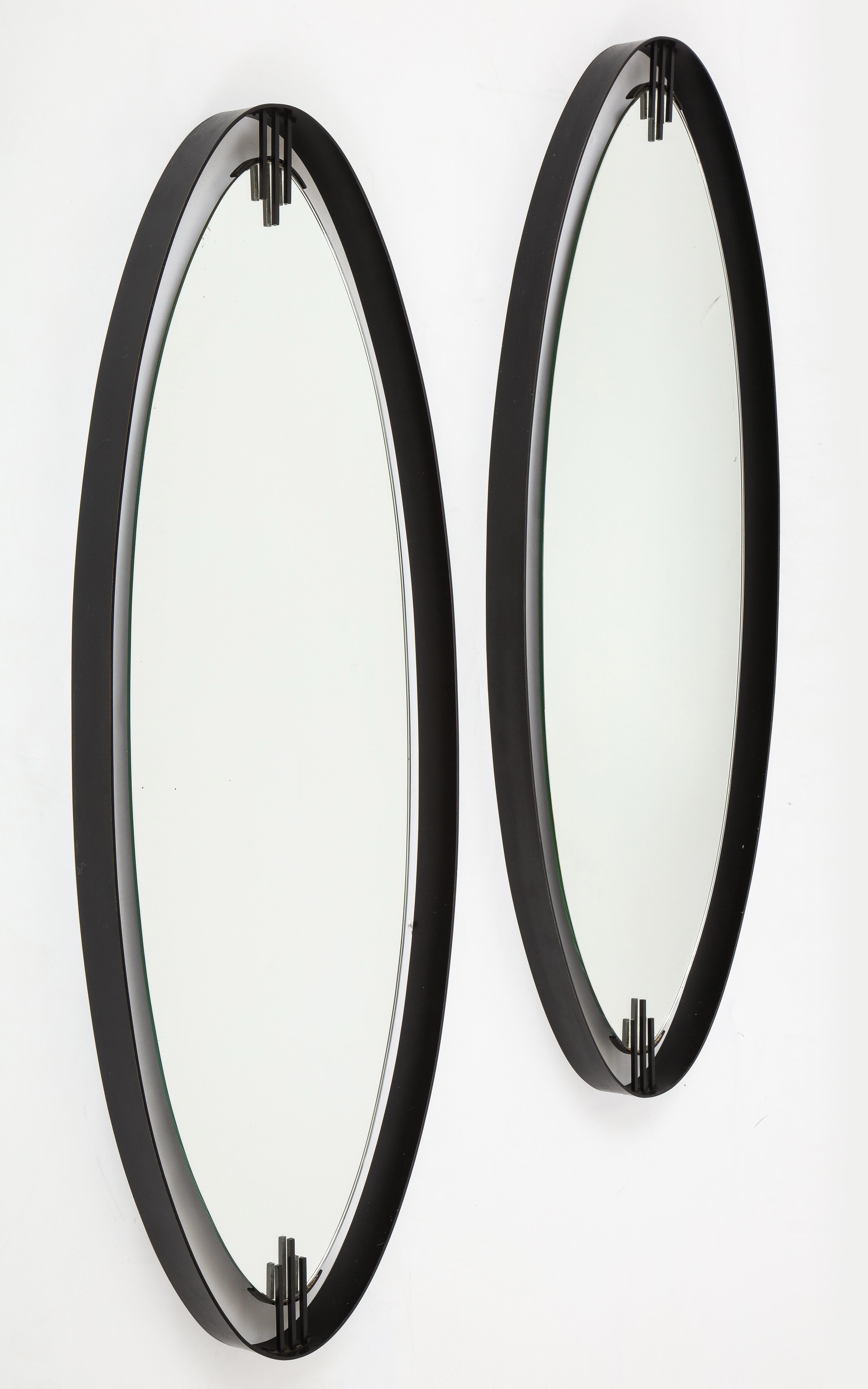 Stunning pair of 1960s modernist Italian mirrors attributed to Ettore Sottsass and manufactured by Santambrogio E Deberti.