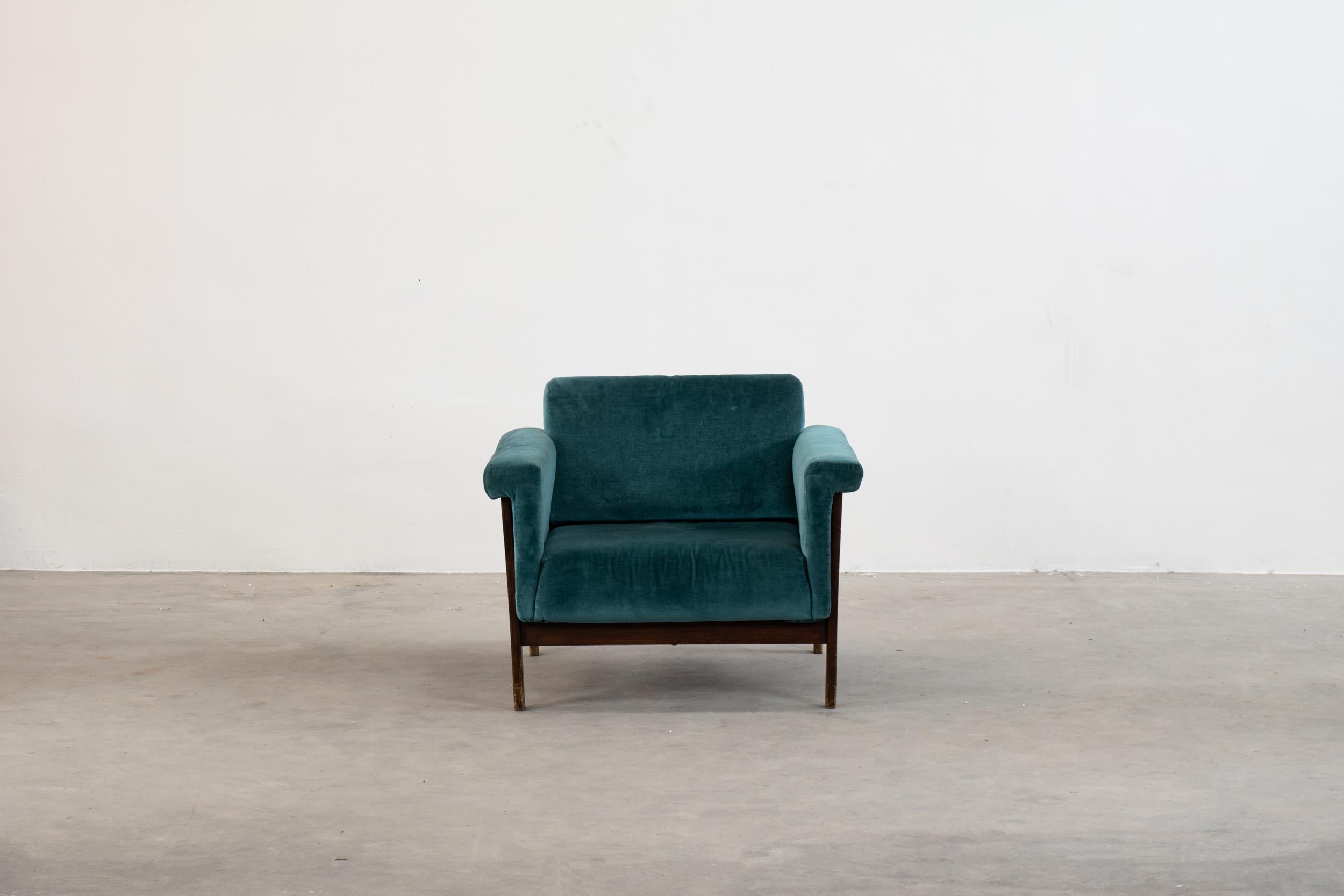 Canada settee armchair with a structure in wood, seat and back in padded blue-green velvet. 
It was designed by Ettore Sottsass Jr in 1959 and produced by the Italian company Poltronova during the 1960s. 

Licterature: P. C. Santini, Facendo