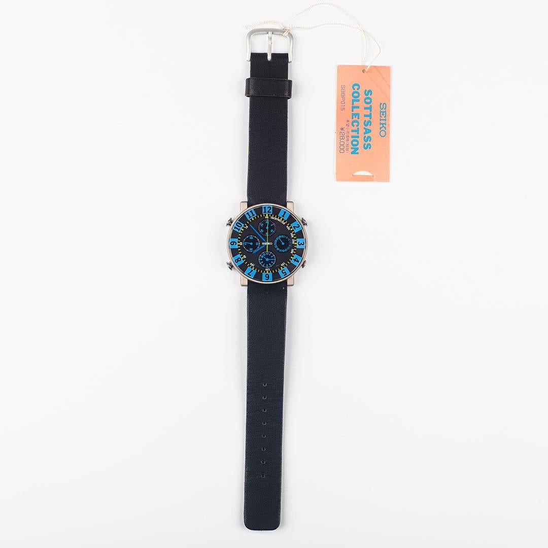 First edition, out-of-production Sottsass Collection chronograph wrist watch designed by Ettore Sottsass, released in Japan by Seiko in 1993. Model SBBP015. Blue and black. A floating effect from colored elements appearing in layers of depth. Clock,