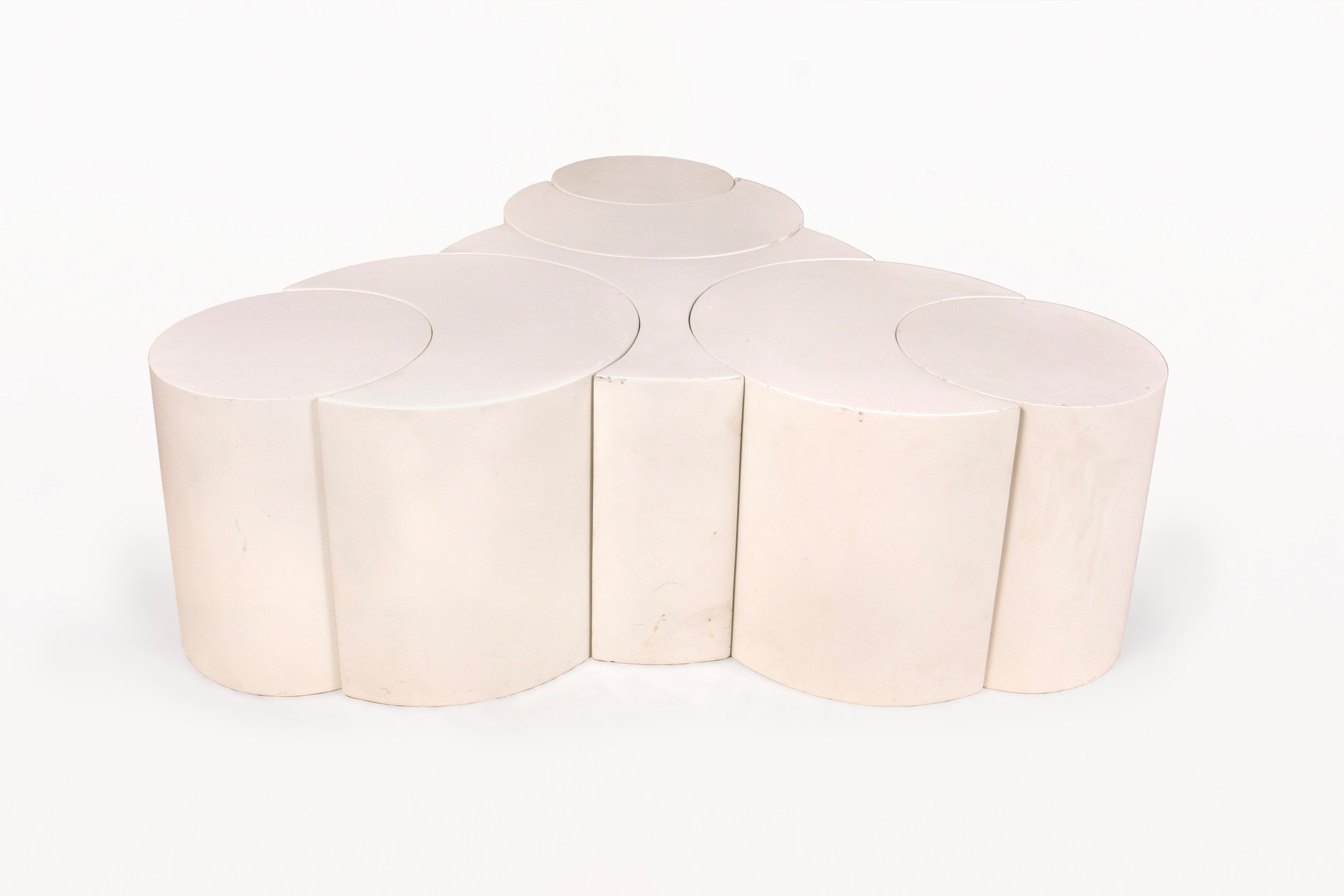 DESCRIPTION: Ettore Sottsass Coffee table, can be divided into 7 parts giving the possibility of dozens of combinations. Very decorative piece made with wood lacquered in white. 

CONDITION: Good condition. Wear consistent with age and