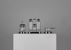 Set di ampolle in acciaio inox e vetro Ettore Sottsass di Alessi 1978 Italia