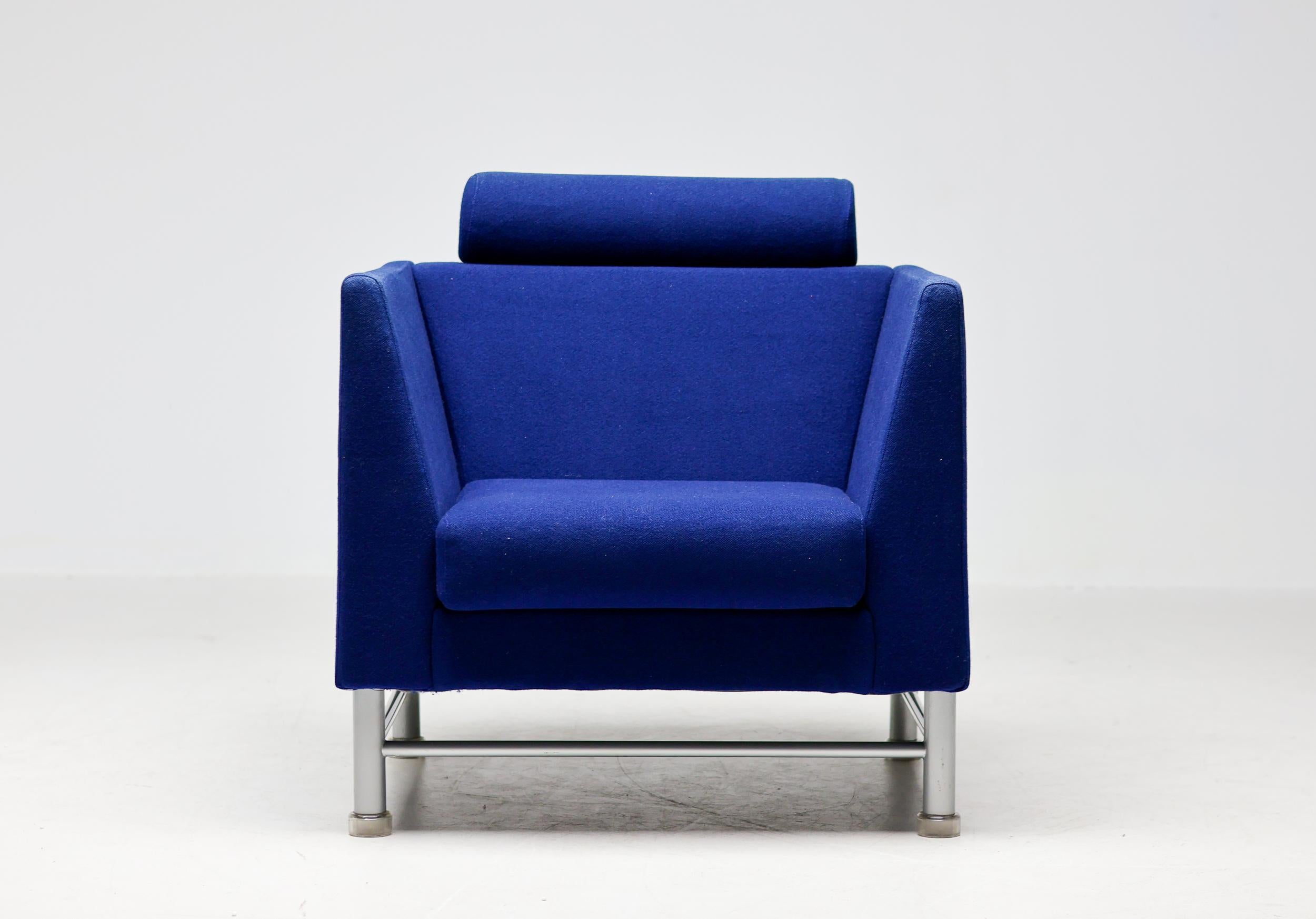 Iconic East Side arm chair in Royal Blue designed by Ettore Sottsass for Knoll International in 1983.
Postmodern chair with original upholstery in wonderful vintage condition.
The chair features a gray enameled steel base with translucent plastic