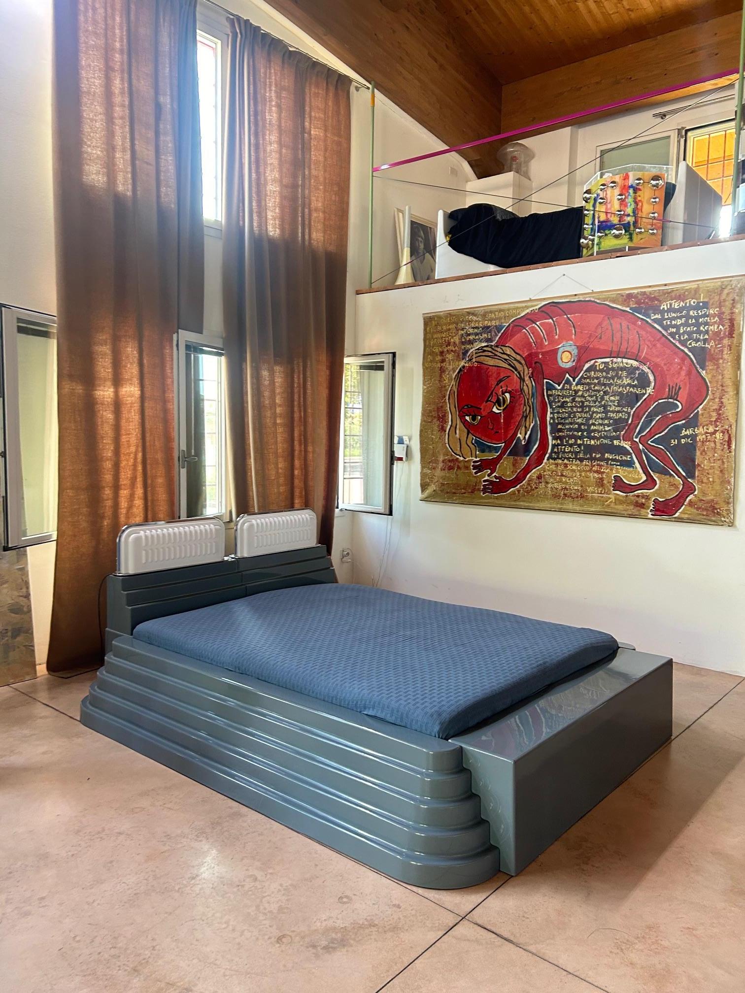 Large and rare double bed by Ettore Sottsass from the 1970 MOBILI GRIGI series with the pair of headboard lamps.  Grey coloured resin frame reinforced with fibreglass. Poltronova Edition.  External bed dimensions: Depth 261 cm, width 220 cm, height