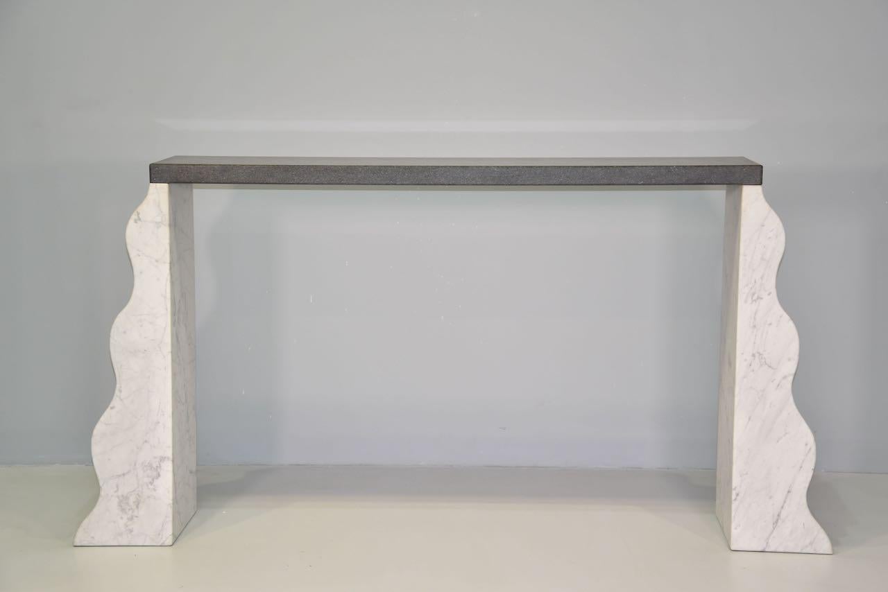 Ettore Sottsass, High console, Model Montenegro, Two wave-shaped white marble feet, Tabletop in granite, circa 1970, Italy.