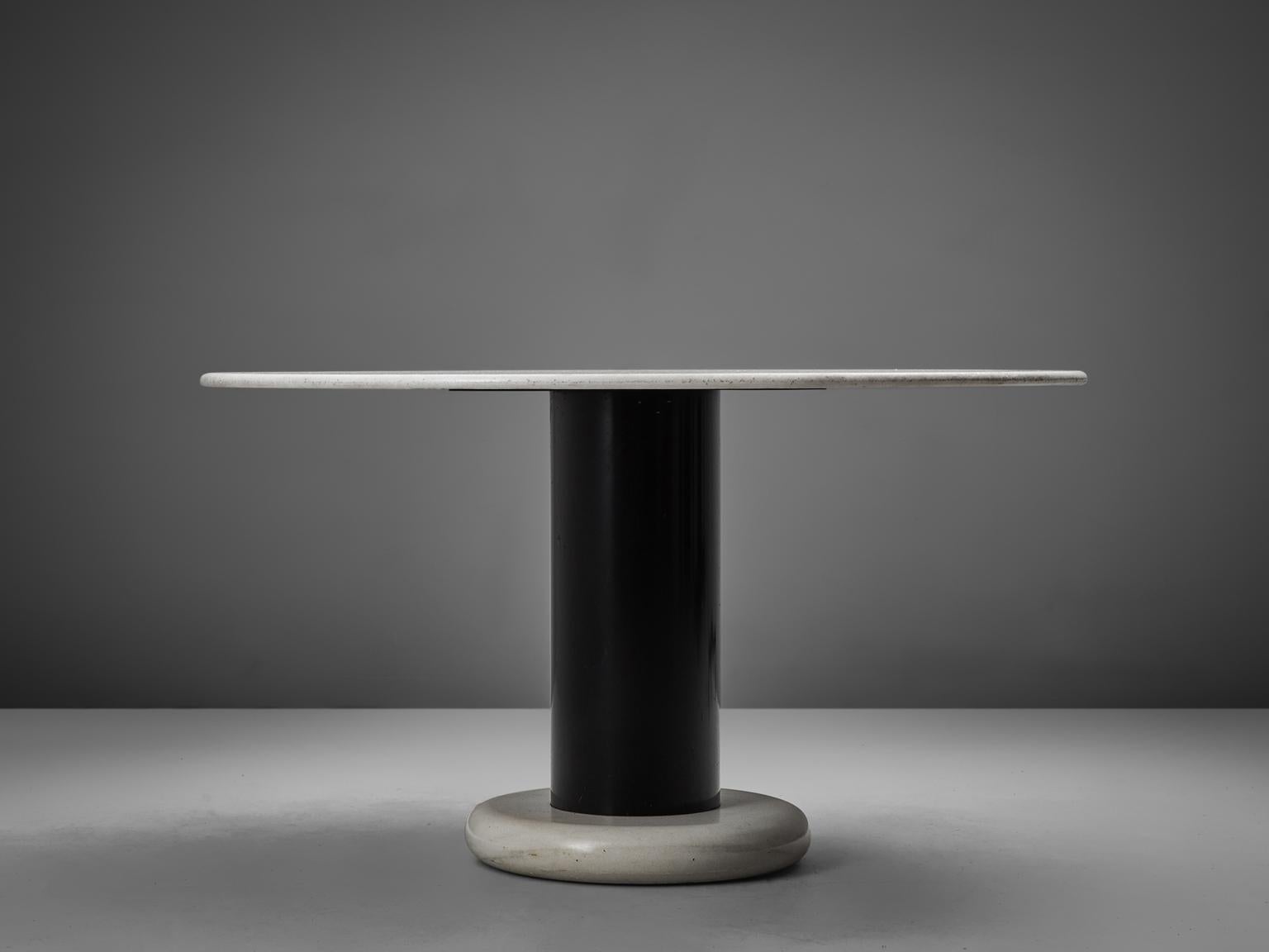 Table, in marble and metal, by Ettore Sottsass for Poltronova, Italy 1965.

Round pedestal table by Italian designer Ettore Sottsass. A white round base with black metal cylindrical column. The round top is executed in beautiful white marble. A