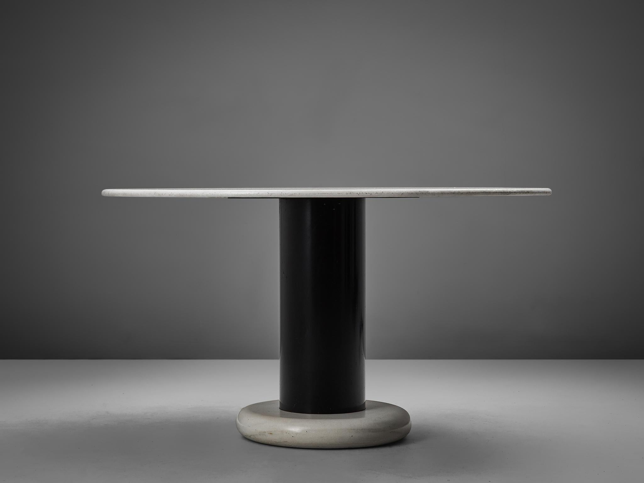 Table, in marble and metal, by Ettore Sottsass for Poltronova, Italy, 1965.

Round pedestal table by Italian designer Ettore Sottsass. A white round base with black metal cylindrical column. The round top is executed in beautiful white marble. A