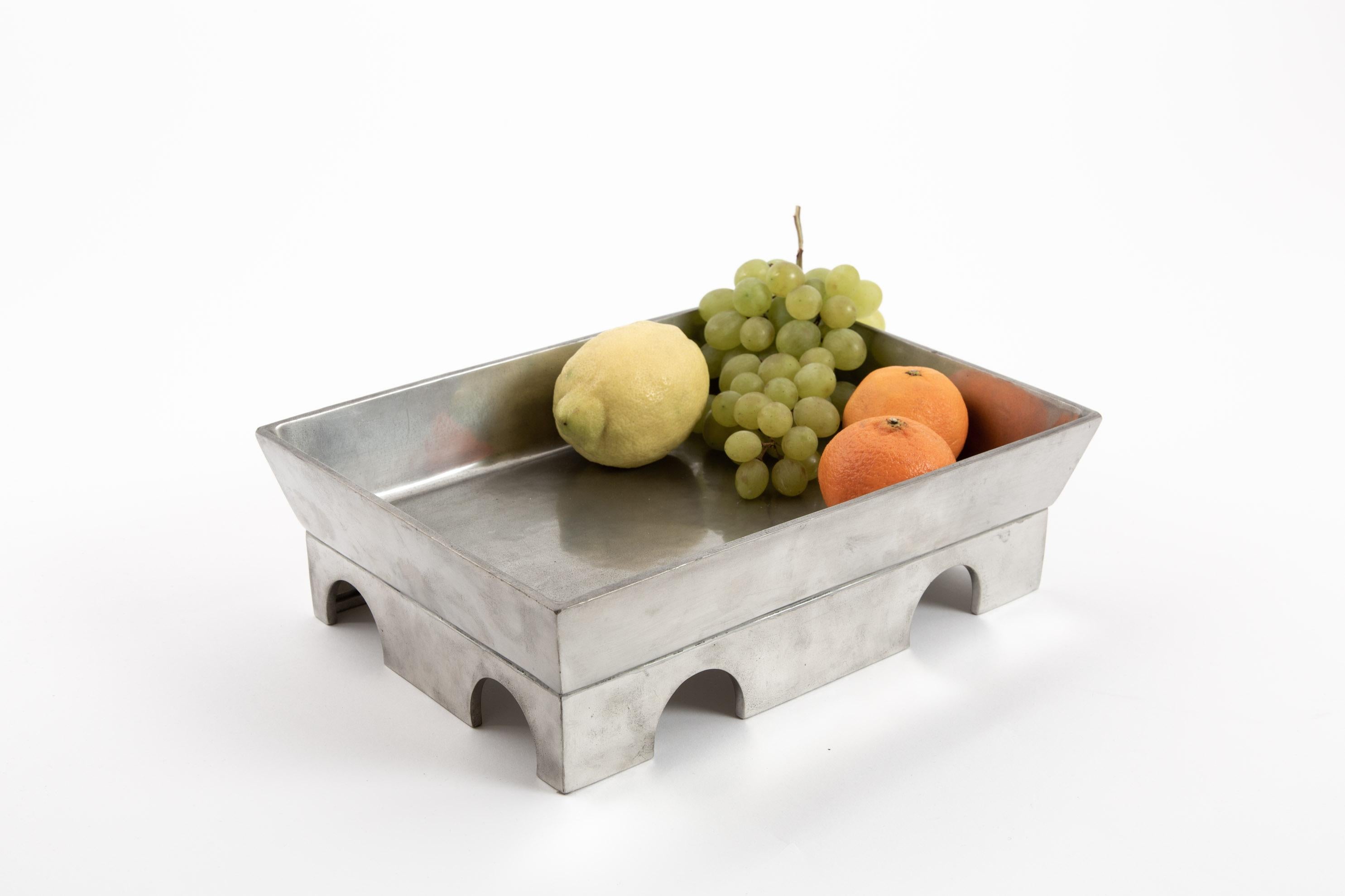 Ettore Sottsass pewter bowl Teodora for Serafino Zani. Produced by Metallia in 1999. Ettore Sottsass designed a serie of pewter centerpieces for the Serafino Zani company. With this pewter bowl you can feel the heavy power of the material. The form