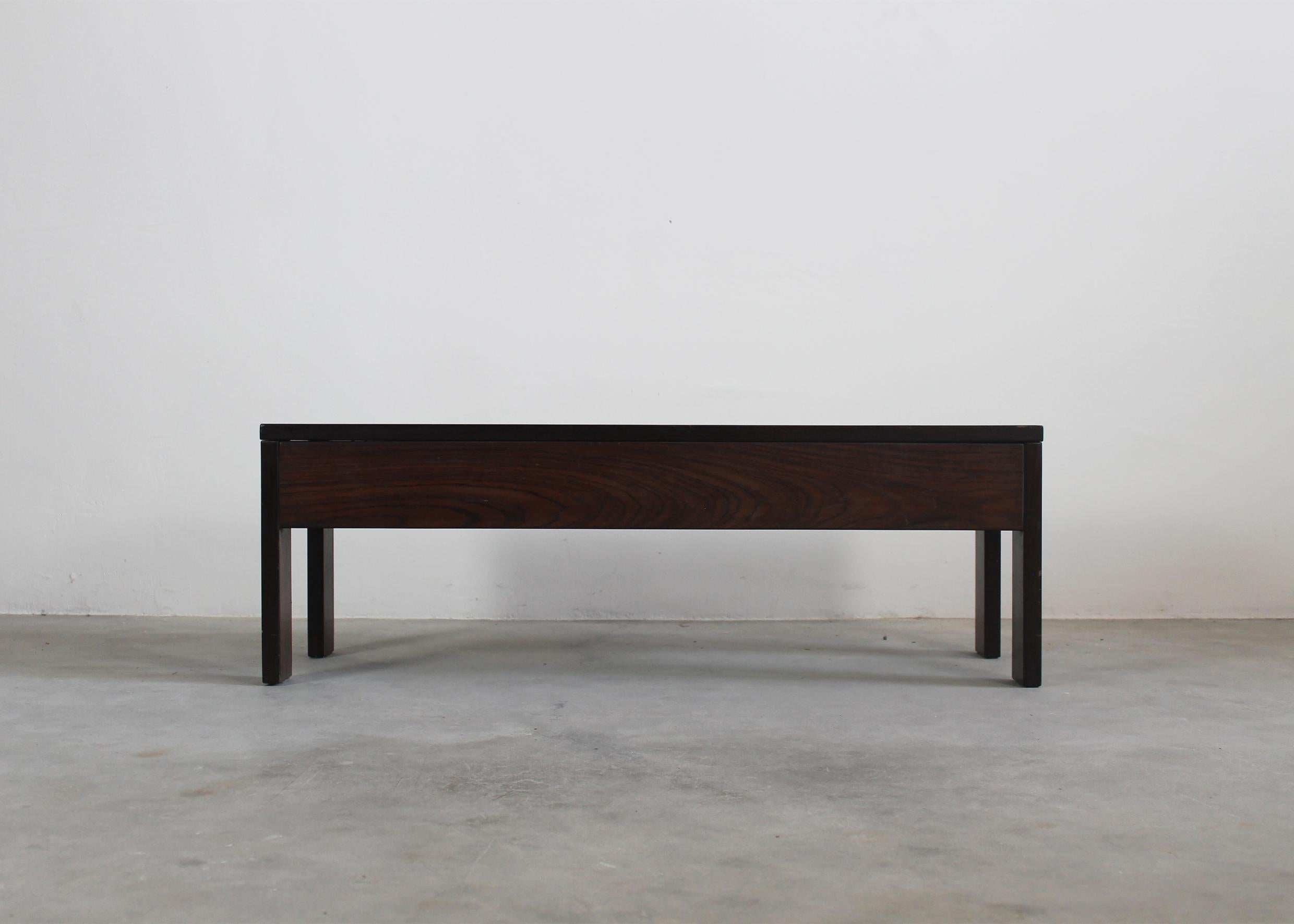 A rectangular low coffee table or sofa table entirely made in wood, designed by Ettore Sottsass for Poltronova, Agliana 1960s. 

The son of an architect, Ettore Sottsass Jr. (1917-2007) was born in Innsbruck, studied in Turin and graduated from