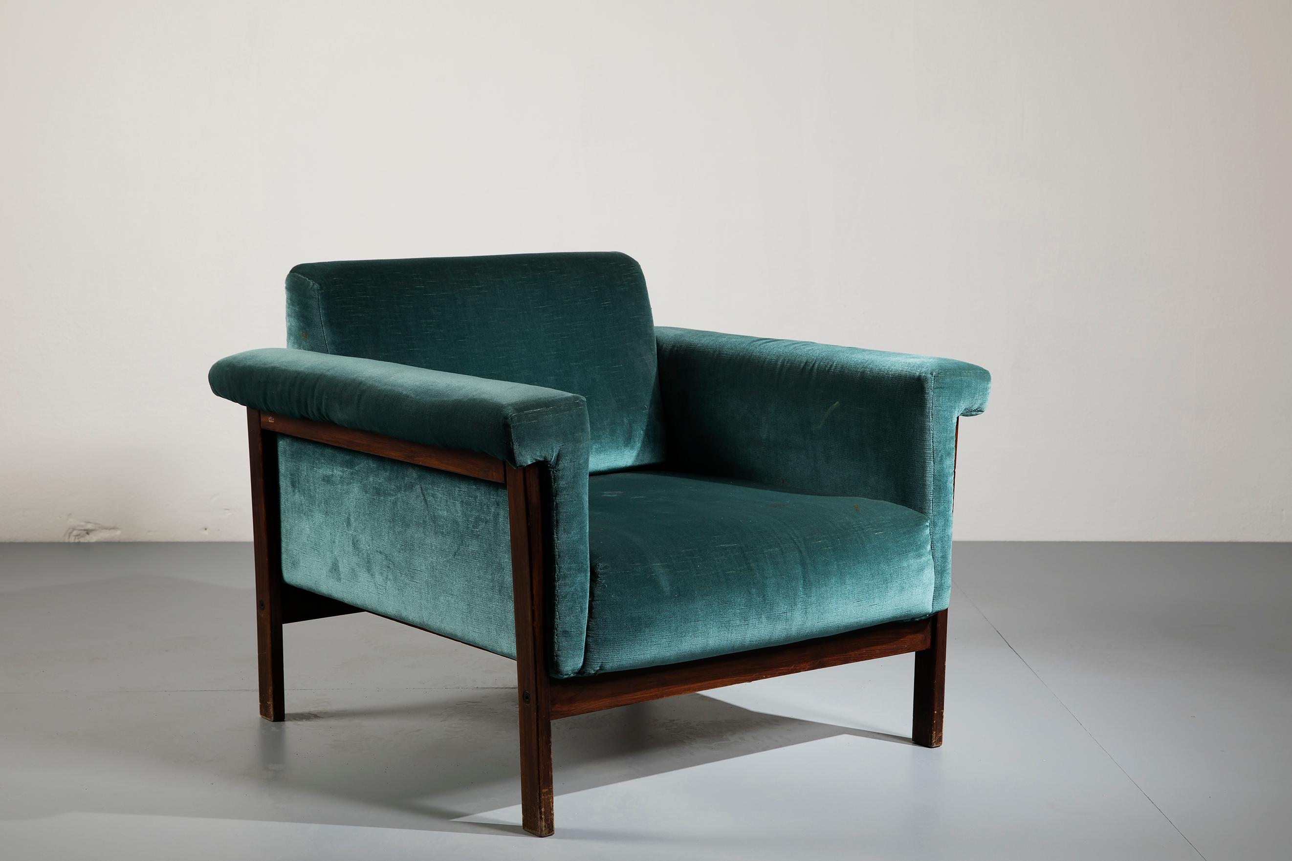 Rare 'Canada' armchair designed by Ettore Sottsass for Poltronova in late 1950s. This one was probably produced around 1958.
The very beautiful teal blue fabric is the original one and it is in good conditions: no scratches and just some little