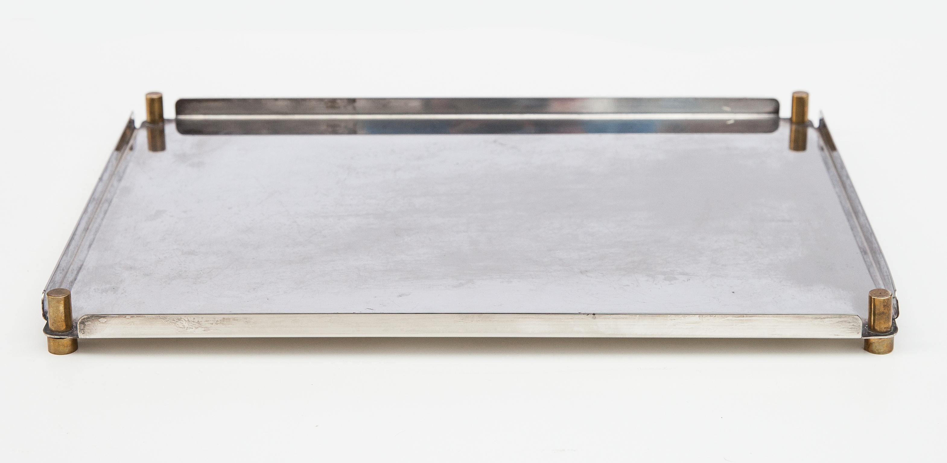 Ettore Sottsass silver plated tray made by Cleto Munari, 1990s. Rectangular shape, signed by the artist ‘Ettore Sottsass’ and the publisher ‘Cleto Munari Silverplate’.