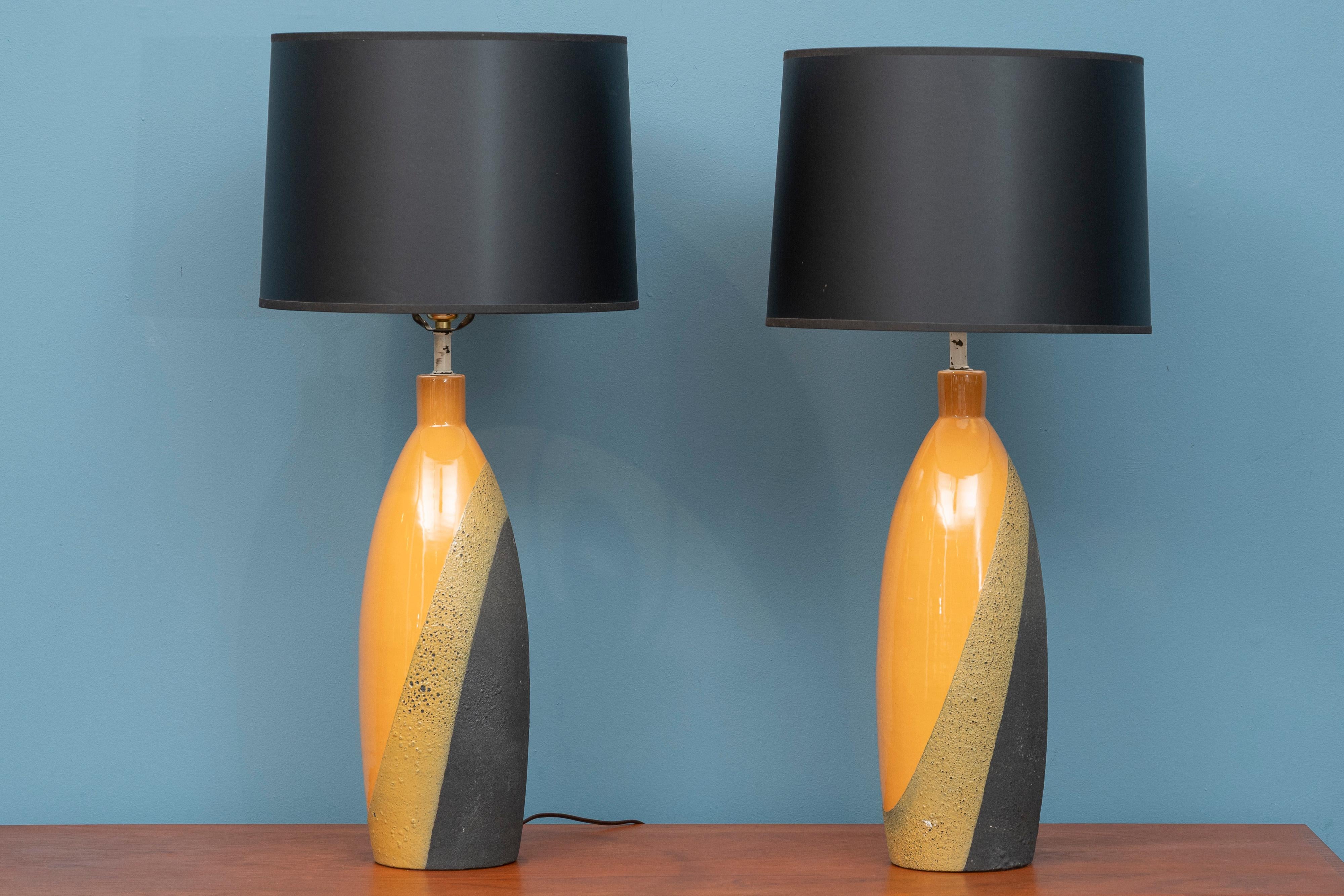 Ettore Sottsass design ceramic table lamps for Bitossi, Italy. 
Originally designed for an Amersterdam department store De Bijenkorf, produced circa 1958. The ovoid lamp form and striking combination of bold colors and textures is both eye catching