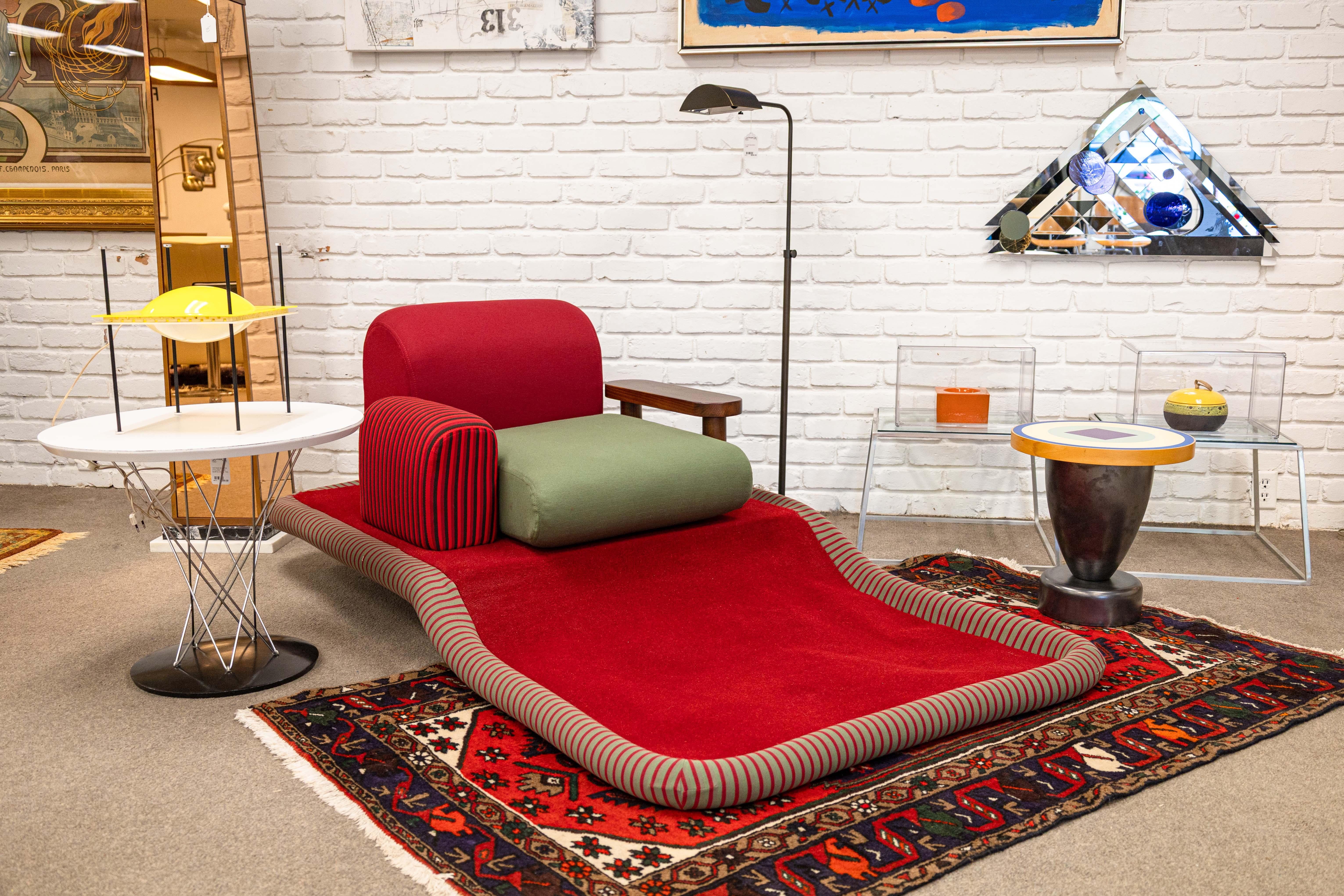 A postmodern lounge chair “Tappeto Volante (Flying Carpet)” designed by Ettore Sottsass for Bedding Brevetti, Italy 1972. Original label adhered to side. Beechwood and stain, stretch-jersey fabric, velvet, and carpeting. A standout example of