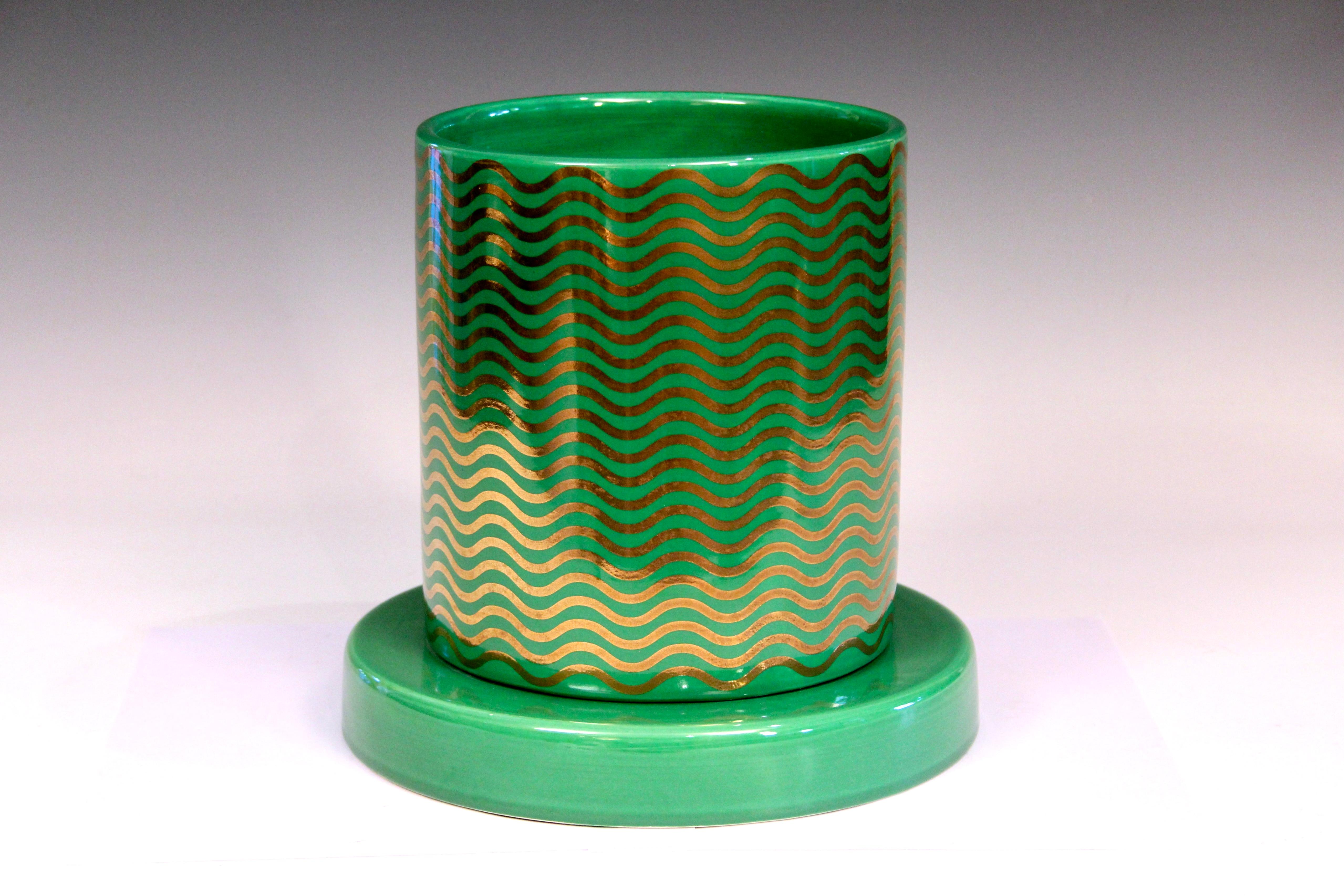 Ettore Sottsass Mediterreneo large vase or urn with gilt waves on a green glazed ground. From an edition of 15, dated 2000. Original Lavori in Corso label. Measures:  9