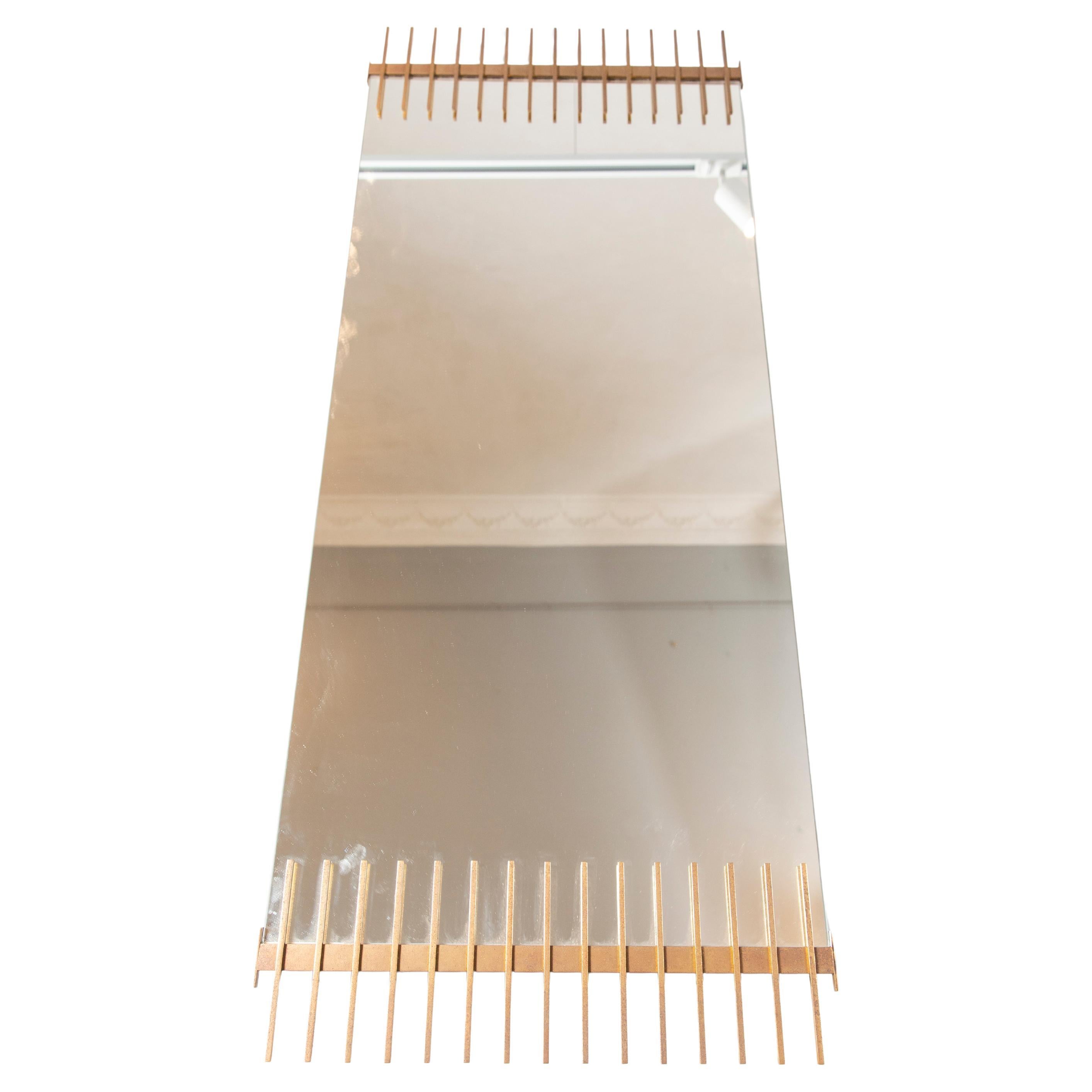 Very rare and beautiful wall mirror by Ettore Sottsass produced by Santambrogio & De Berti with brass .