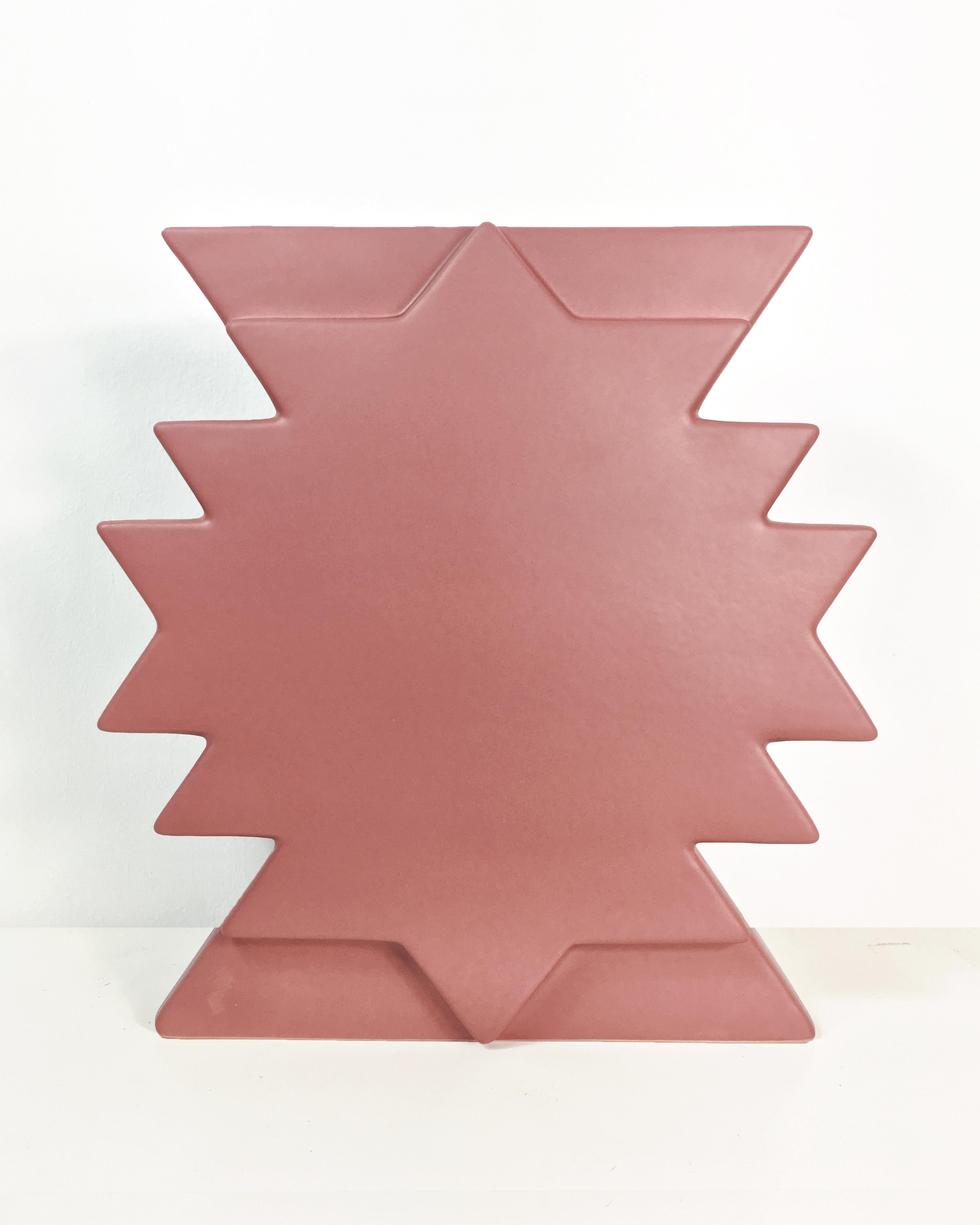 Glazed ceramic vase in the pale orange color by Ettore Sottsass. The polygonal shaped vase was designed as a part of the Yantra Series. The basement has sign of the author.