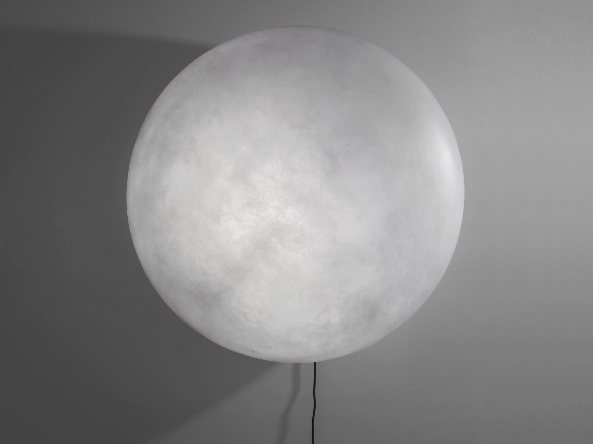 Etty lamp by Imperfettolab
2015
Designer : Verter Turroni
Dimensions: Ø 50 X 15 cm
Materials: fibreglass
Available in other sizes.

A lamp that, like a moon high in the sky or reflected in the water, is capable of creating a warm light point,