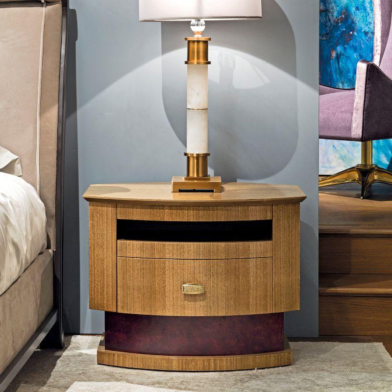 Ideally combined with the Eucalyptus Dresser for a cohesive and lavish style, this gorgeous bedside table is a sublime showcase of craftsmanship. Handmade of eucalyptus wood enriched with parchment leather-upholstered details, it features a brass