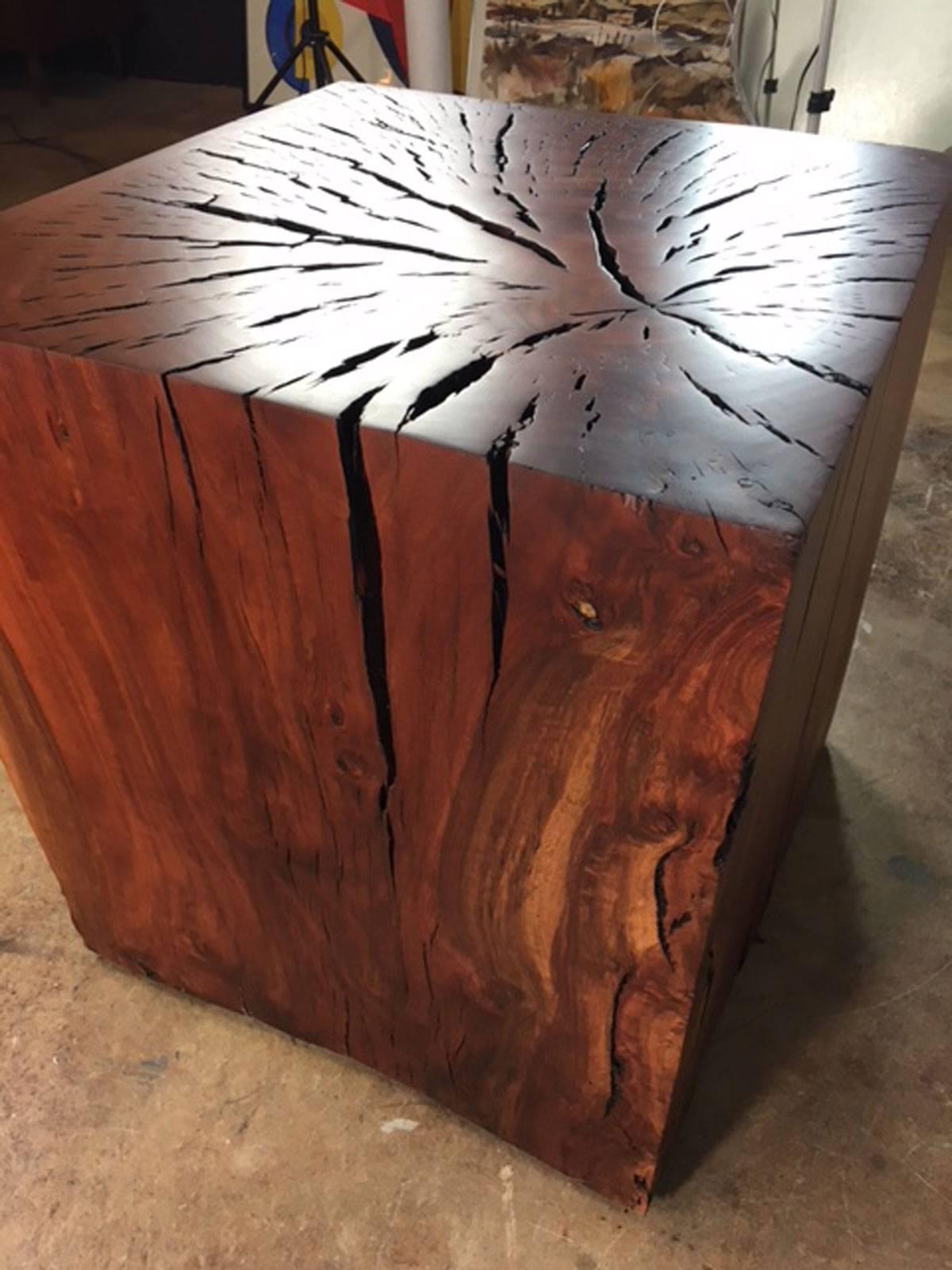 Eucalyptus wood end table or art display pedestal designed and produced by master wood artist and designer Scott Mills who only uses reclaimed (deadfall or storm downed trees) in the pieces he produces. This piece is solid eucalyptus wood. No veneer.