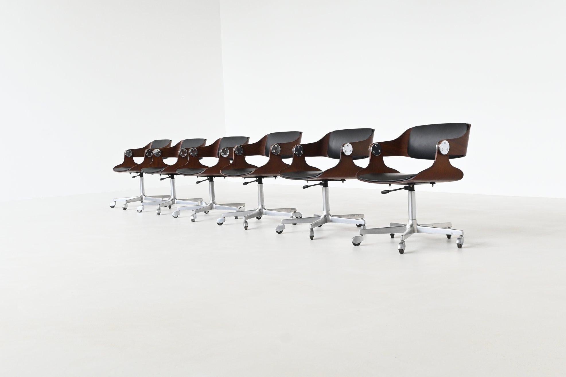 Exceptional set of six conference or dining chairs designed and manufactured by Eugen Schmidt, Germany 1965. These chairs showcase the clean lines and innovative functionality of German modernism. Each chair features a sculptural teak plywood shell