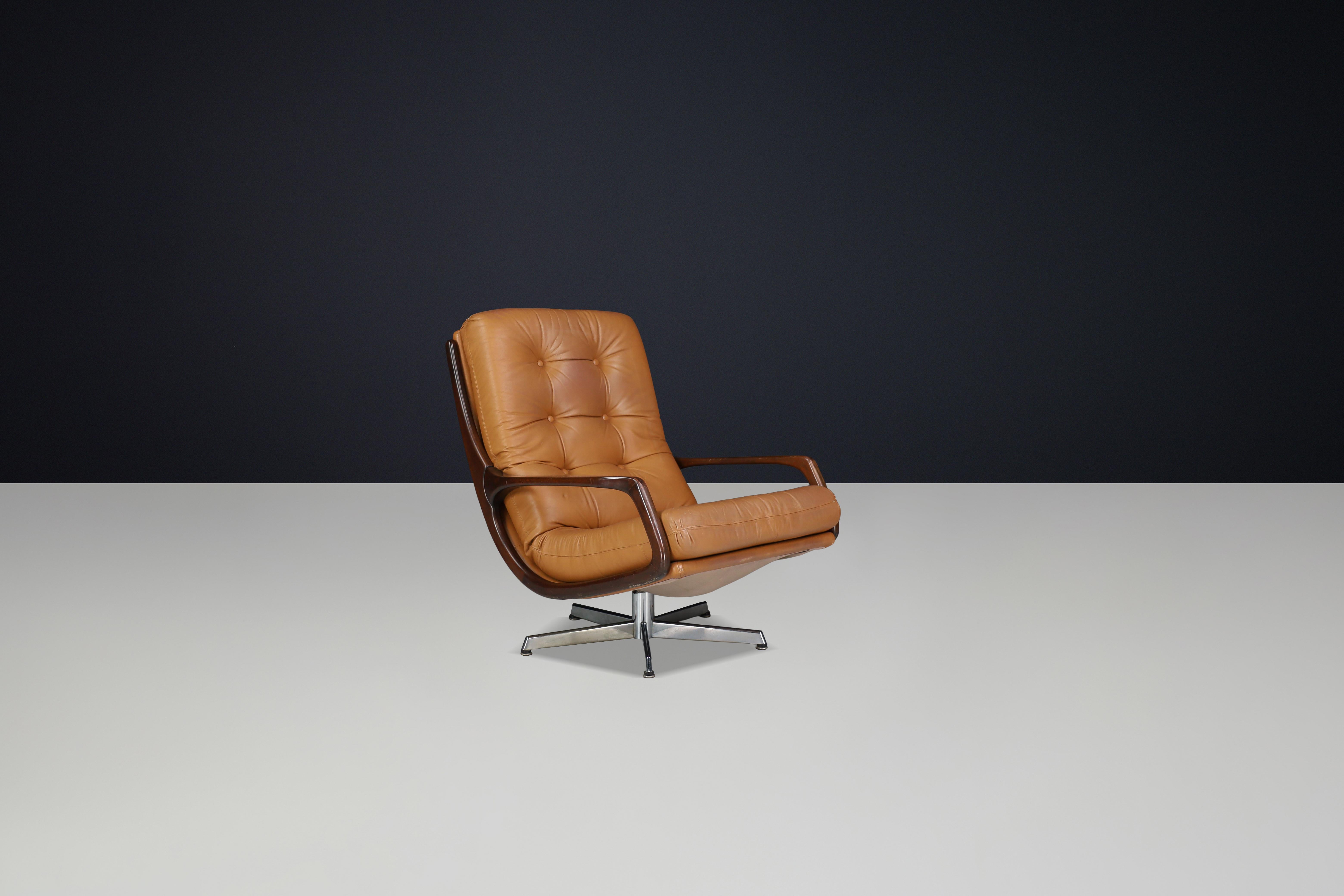 Metal Eugen Schmidt Swivel Lounge Chair and Ottoman in Cognac Leather, Germany, 1970s For Sale