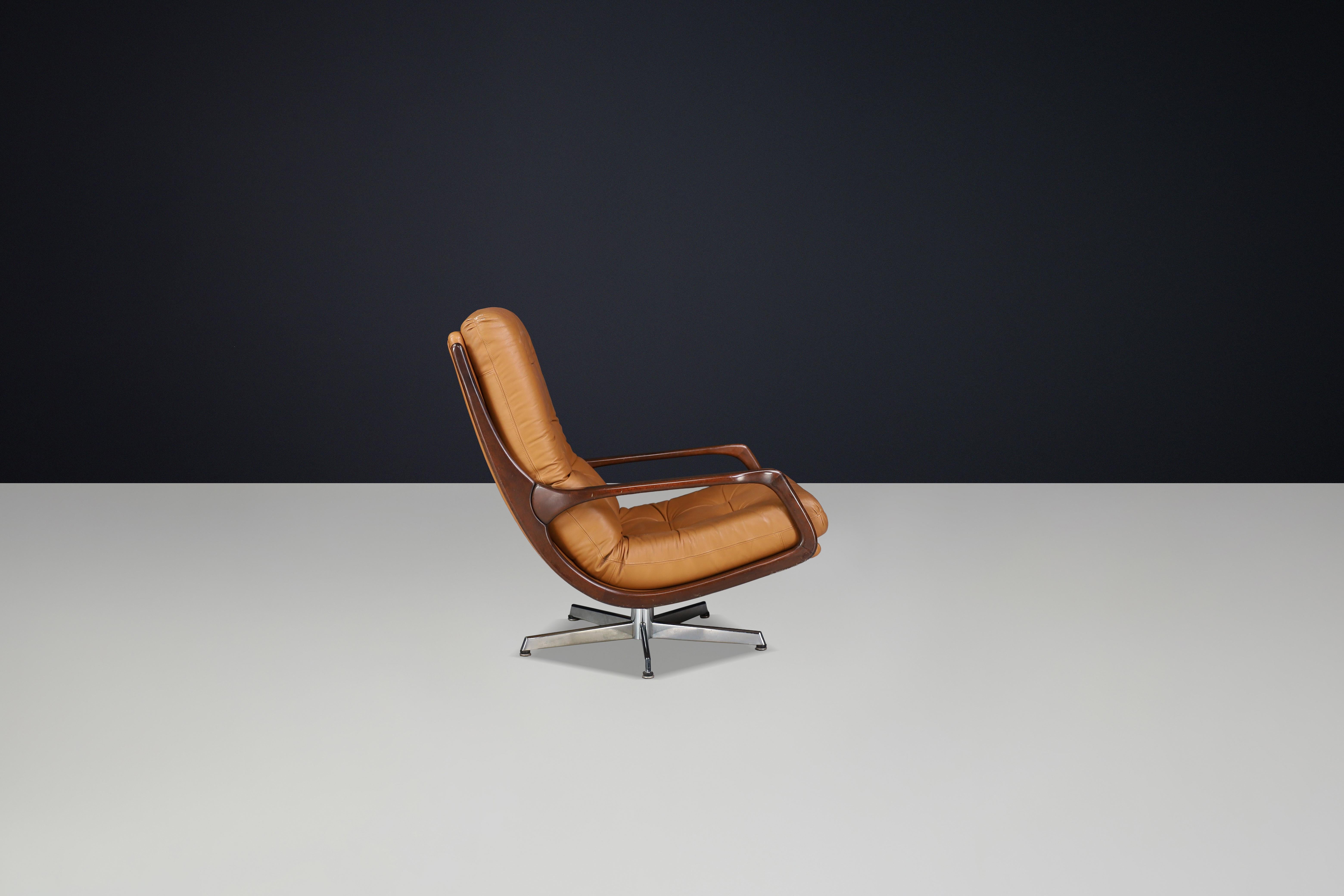 Eugen Schmidt Swivel Lounge Chair and Ottoman in Cognac Leather, Germany, 1970s For Sale 1