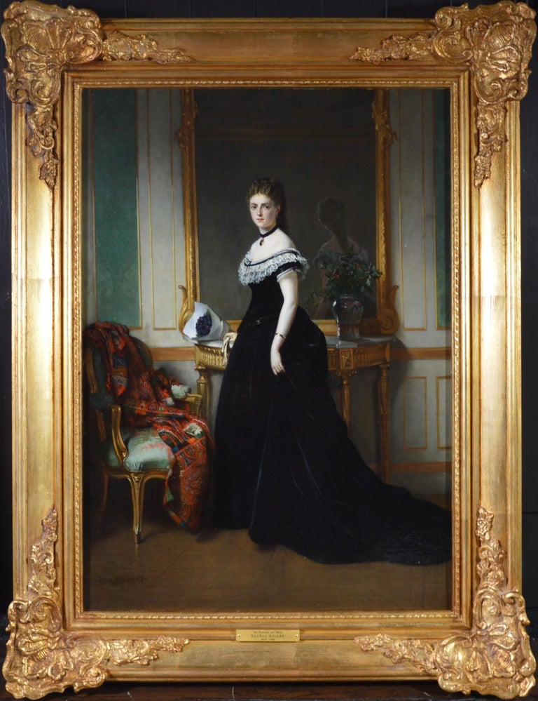 ‘Le Femme en Noir’ by Eugène Accard (1824-1888). This fine 19th century French full-length portrait of a young Parisienne beauty is signed by the artist and presented in a superb quality, bespoke gold metal leaf frame.

As with all the paintings we