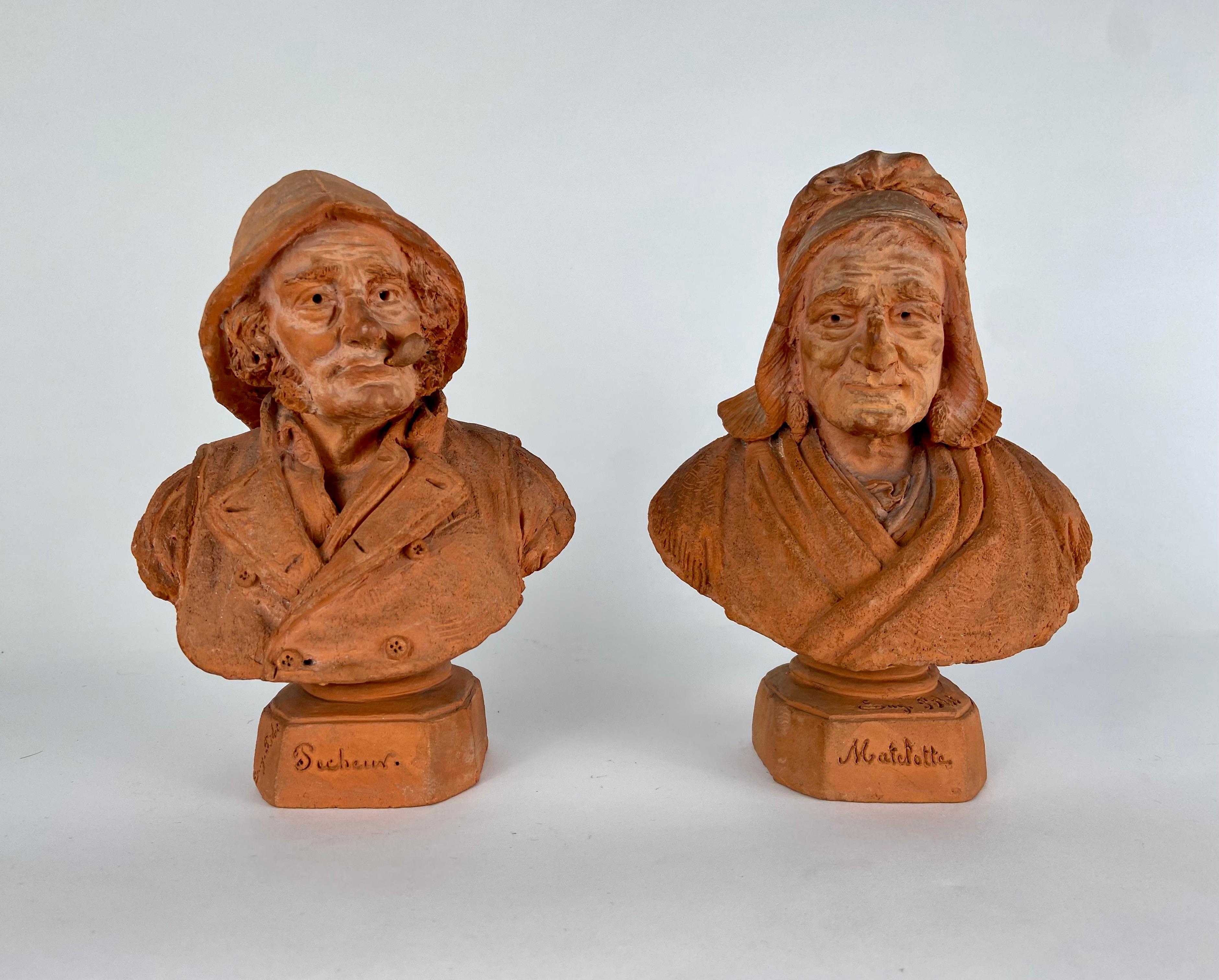 Paire de petits bustes en terre cuite du sculpteur français 
Eugène Blot (Grandvillers 1830-1899). Signé sur la base.