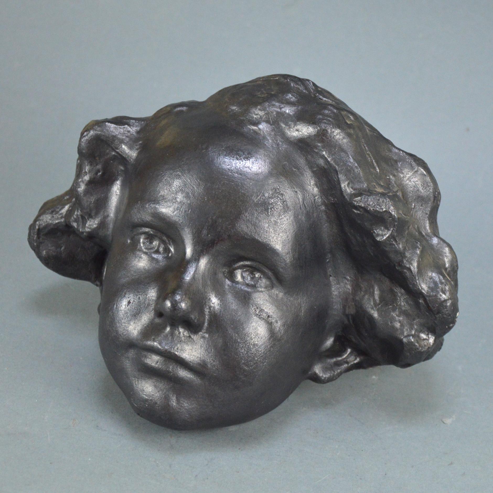 Eugène Canneel (1882-1966) patinated plaster cast wall-mounted sculpture boys face. In the style of Art Nouveau.
Dimensions: 24 x 20 x 11 cm.
  