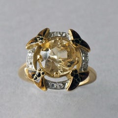EUGÈNE FEUILLÂTRE An Art Nouveau Gold, Topaz and Diamond Insect Ring circa 1900