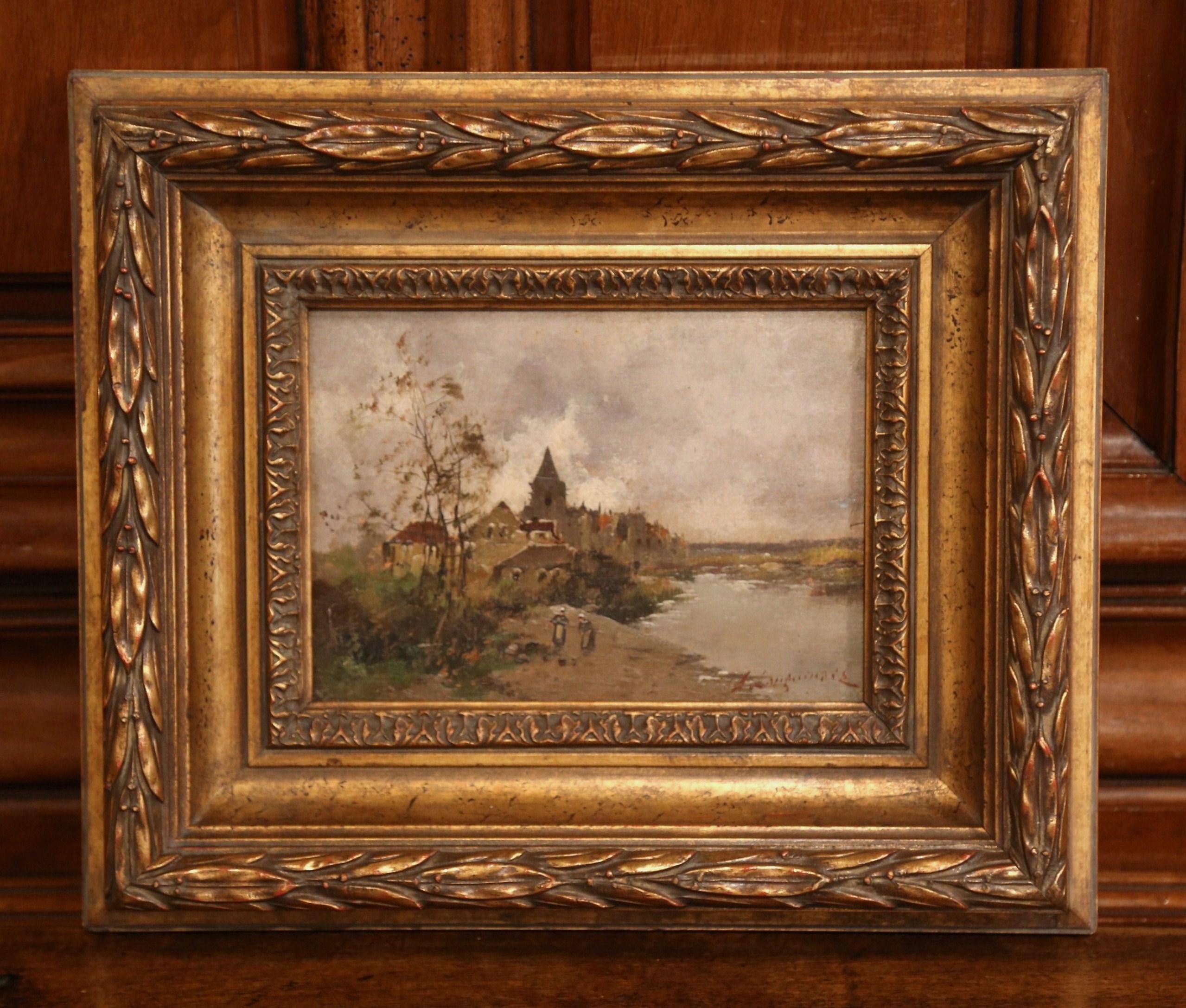 This pair of 19th century impressionist paintings feature two landscapes of rural France. Set in carved, gilt wood frames, the paintings are oil on board, and illustrate picturesque, countryside scenes. Both art works were done circa 1890, and are