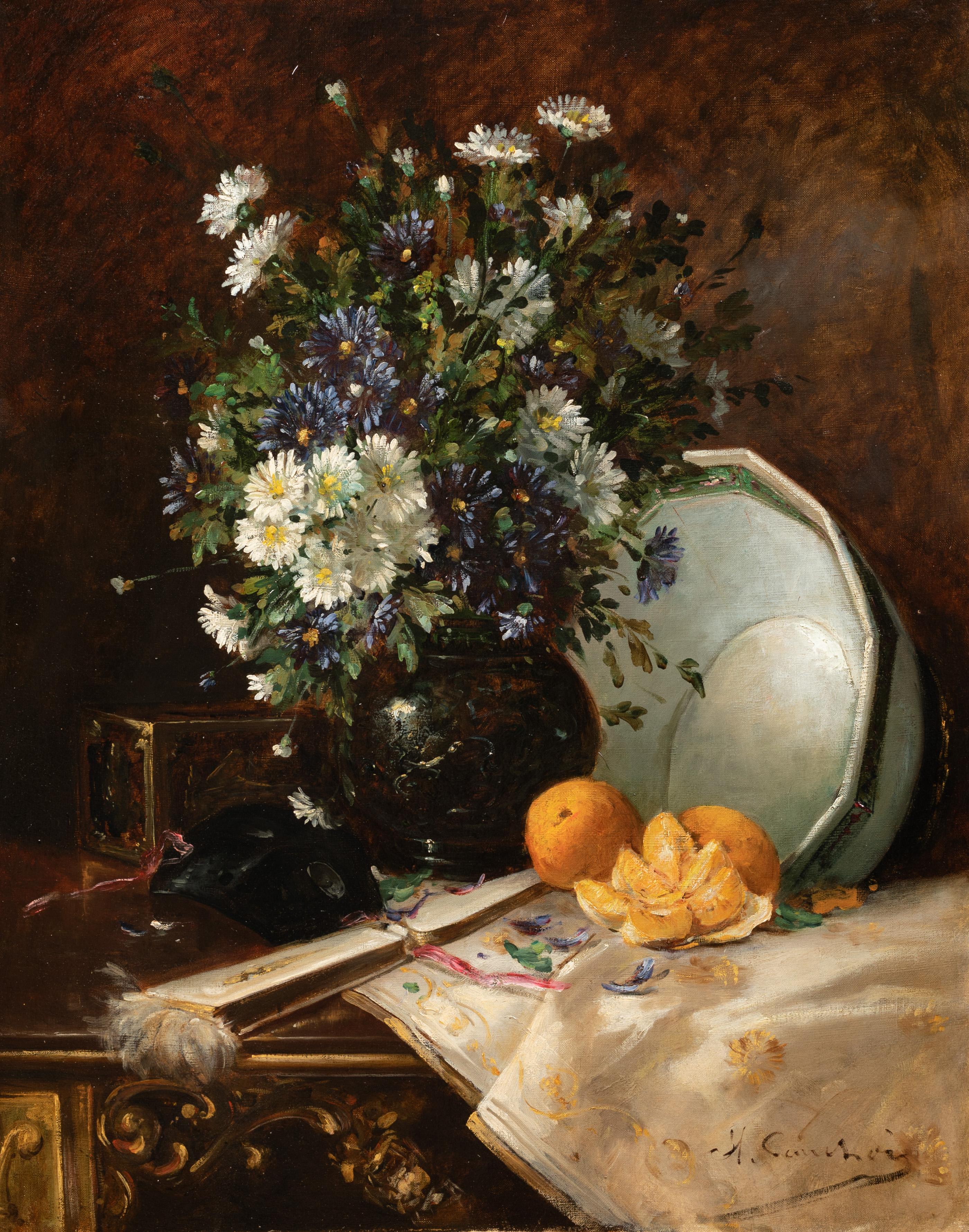 This oil on canvas signed Eugène Henri Cauchois (1850-1911) represents an interesting still life. The vocabulary is as follows: On a gilded wooden console is affixed citrus fruits standing near a fan. A carnival mask sits in front of the flower