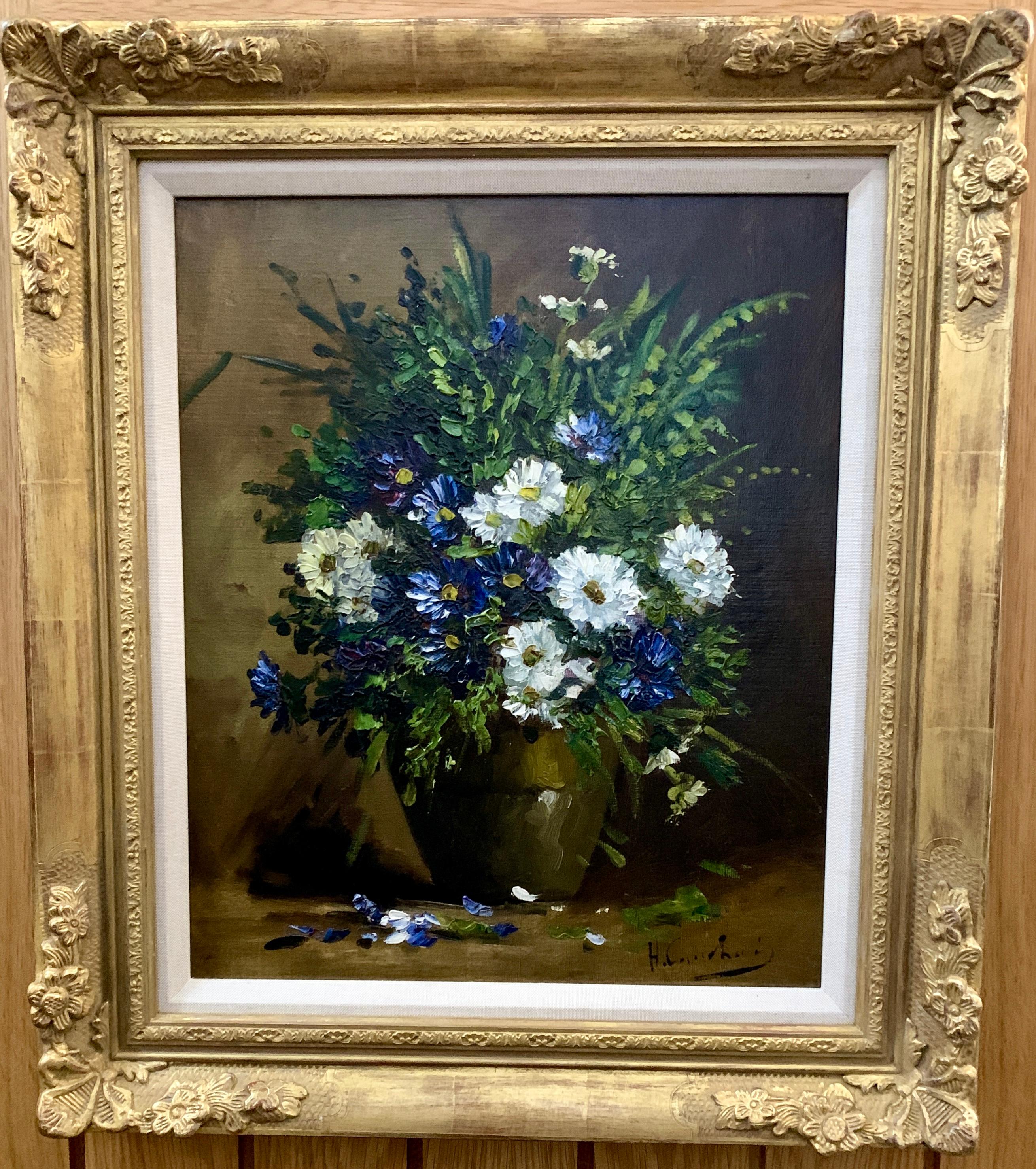French early 20th century Still life of blue, white and green flowers in a vase - Painting by Eugene Henri Cauchois