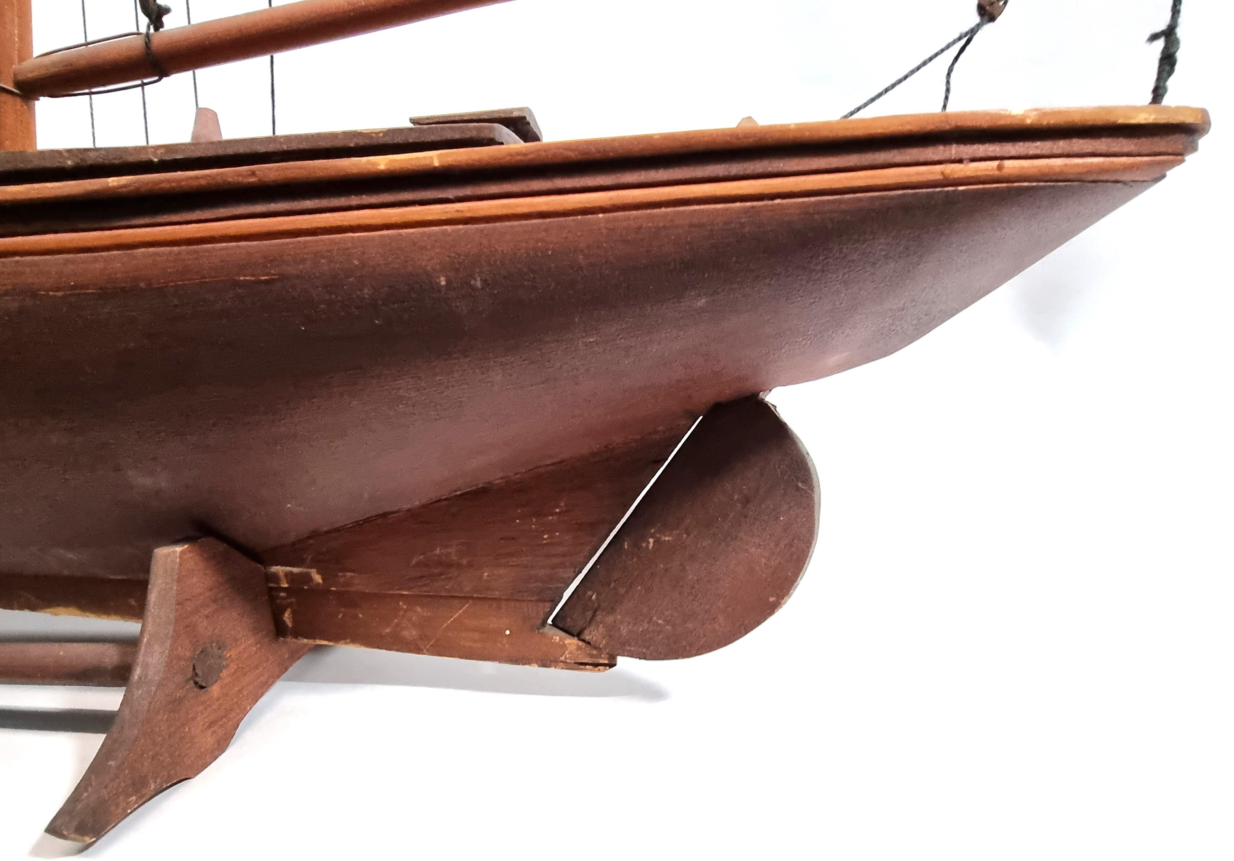 Eugene Leclerc Bluenose Ship Model
Eugene Leclerc, Canadian, (1885-1968)

Handsomely handmade model of The Bluenose created by Saint-Jean-Port-Joli, Quebec artist Eugene Leclerc likely during the 1940's, appears to have all original rigging and