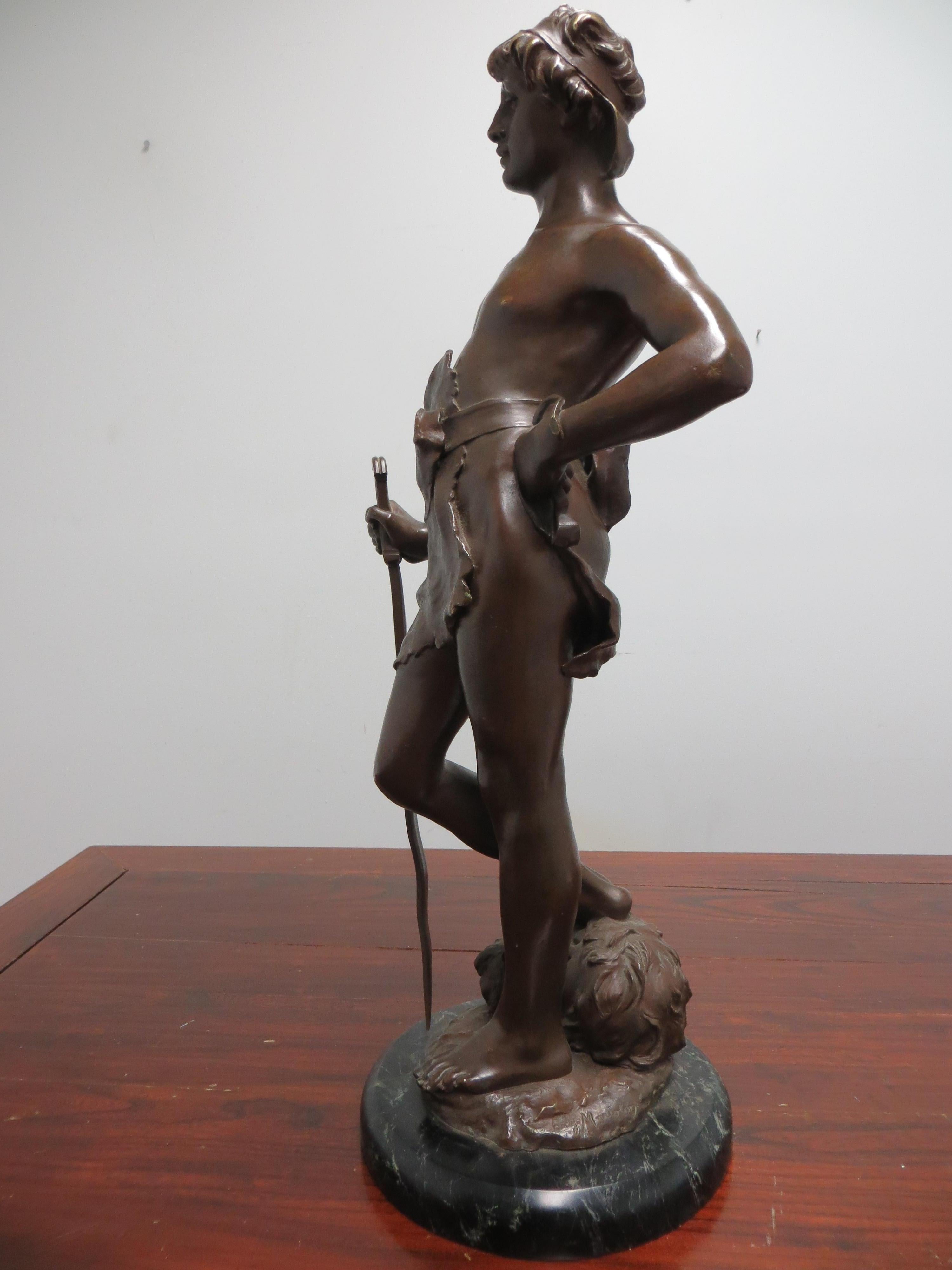 David avec la tête de Goliath, bronze - Sculpture de Eugene Marioton