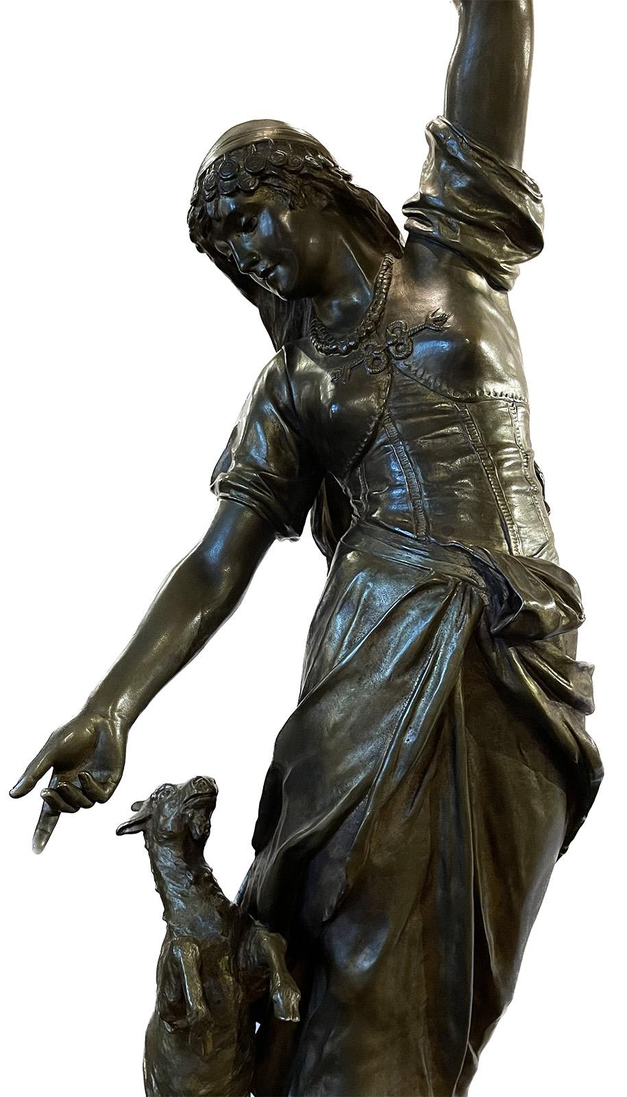 Bronze figure sculpture of Esmeralda mounted into a lamp signed by Eugene Marioton (French, 1857 - 1933).