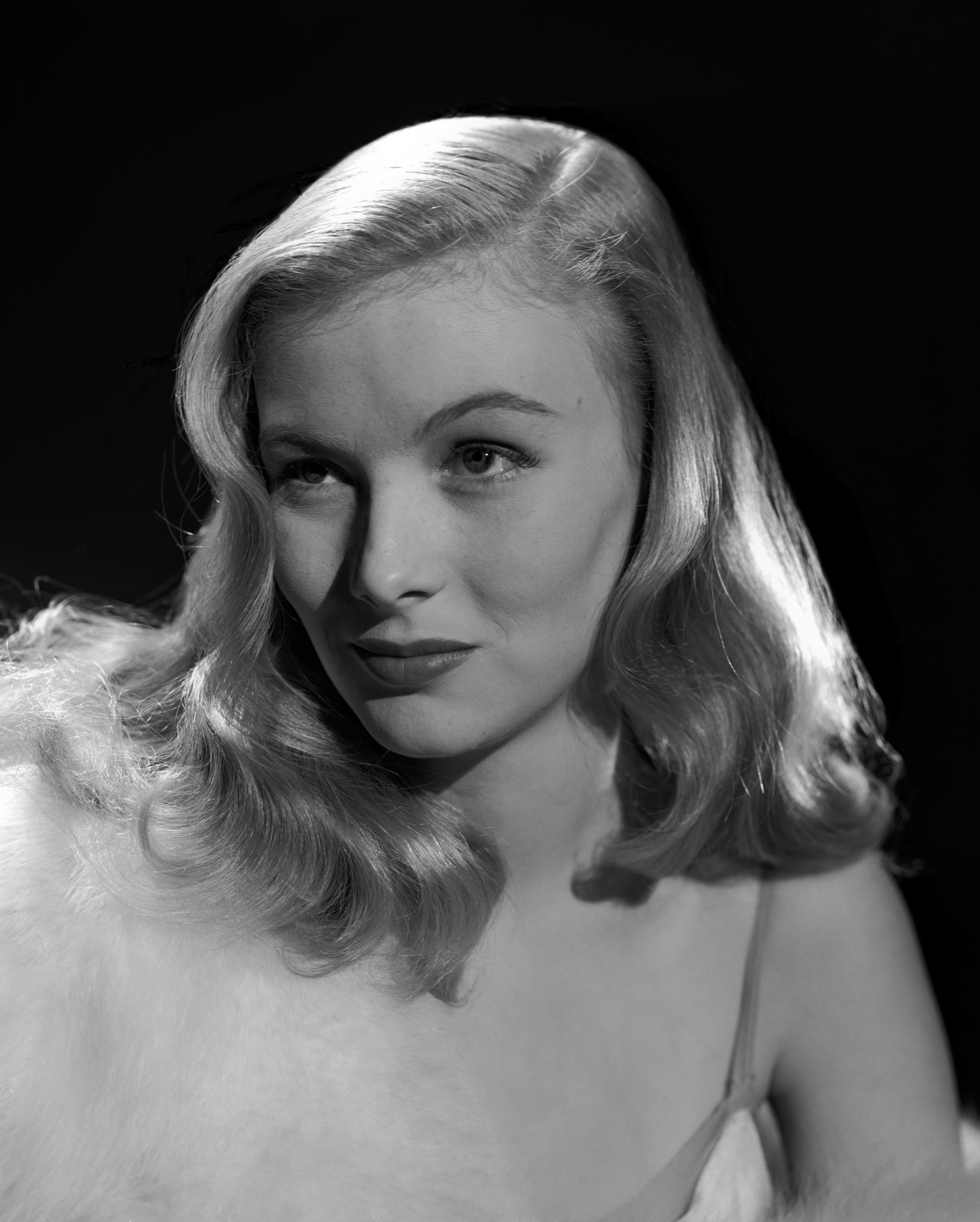 Eugene Robert Richee Black and White Photograph - Veronica Lake with Sly Smile Movie Star News Fine Art Print