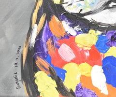 Portrait de taureau jouant portant une tête de lit en taches colorées peint sur toile