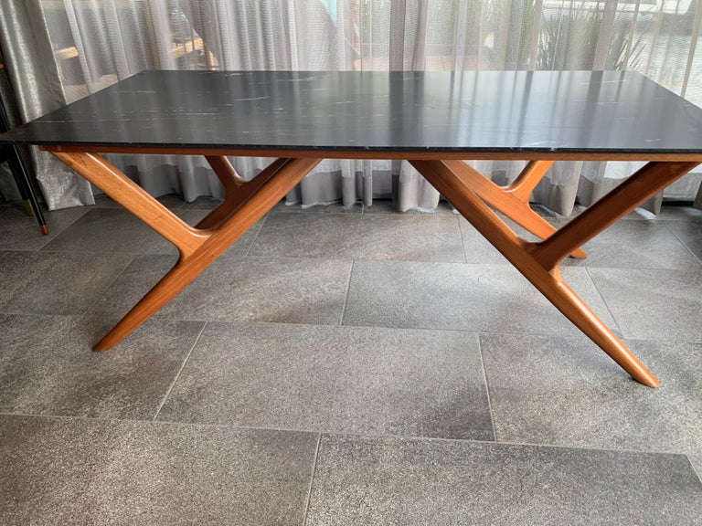 Beautiful work of art, part of the legacy that Eugenio Escudero leaves us. For your consideration, dining table or desk with spectacular design, angles and assemblies or joints.
 Granite or Glass is not included.