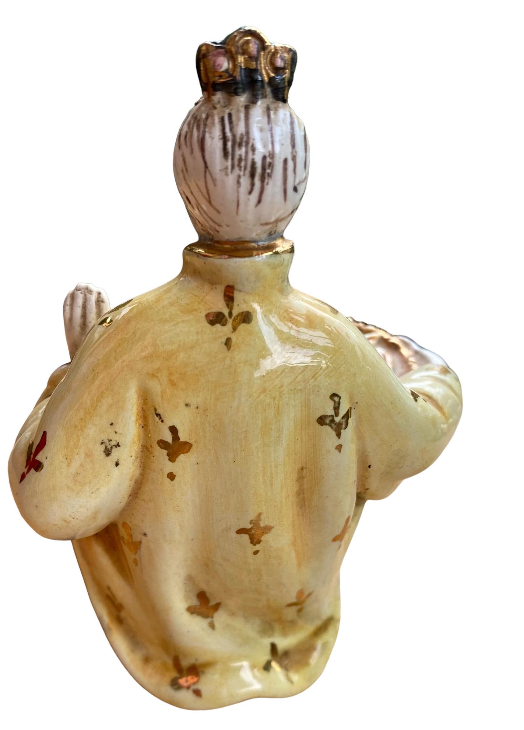 Eugenio Pattarino ceramic statue.
Beautiful statuette depicting an Asian girl holding a fruit basket by Eugenio Pattarino
Sculptor and ceramist Eugenio Pattarino was born in Florence in 1885 where he attended the Academy of Fine Arts, a pupil of