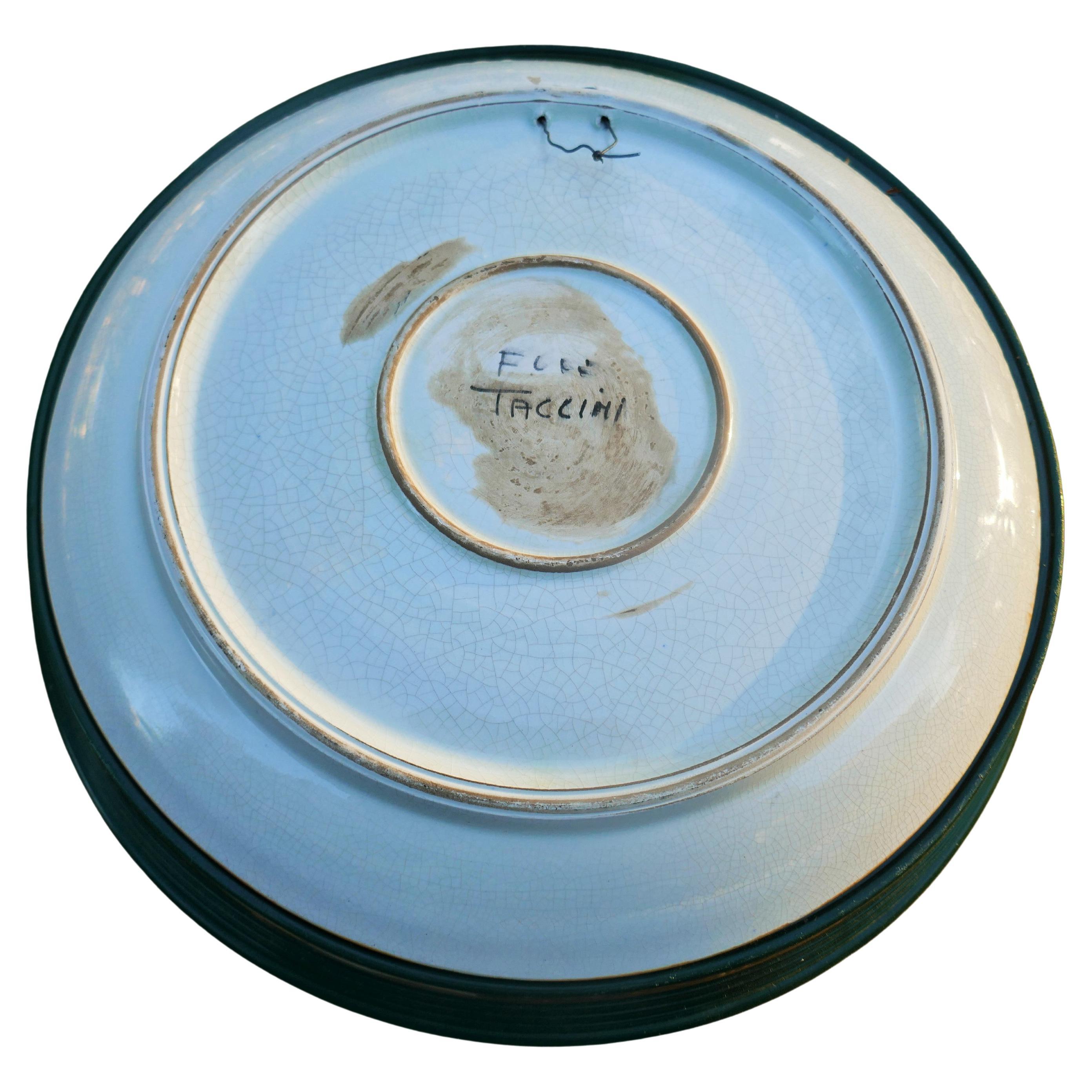 Assiette en majolique Eugenio Taccini Montelupo.
Bon état.
Nous vous remercions.