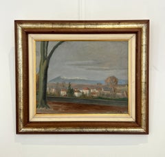 Vue sur un village et des montagnes enneigées