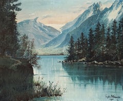 Small lake at the foot of the mountains