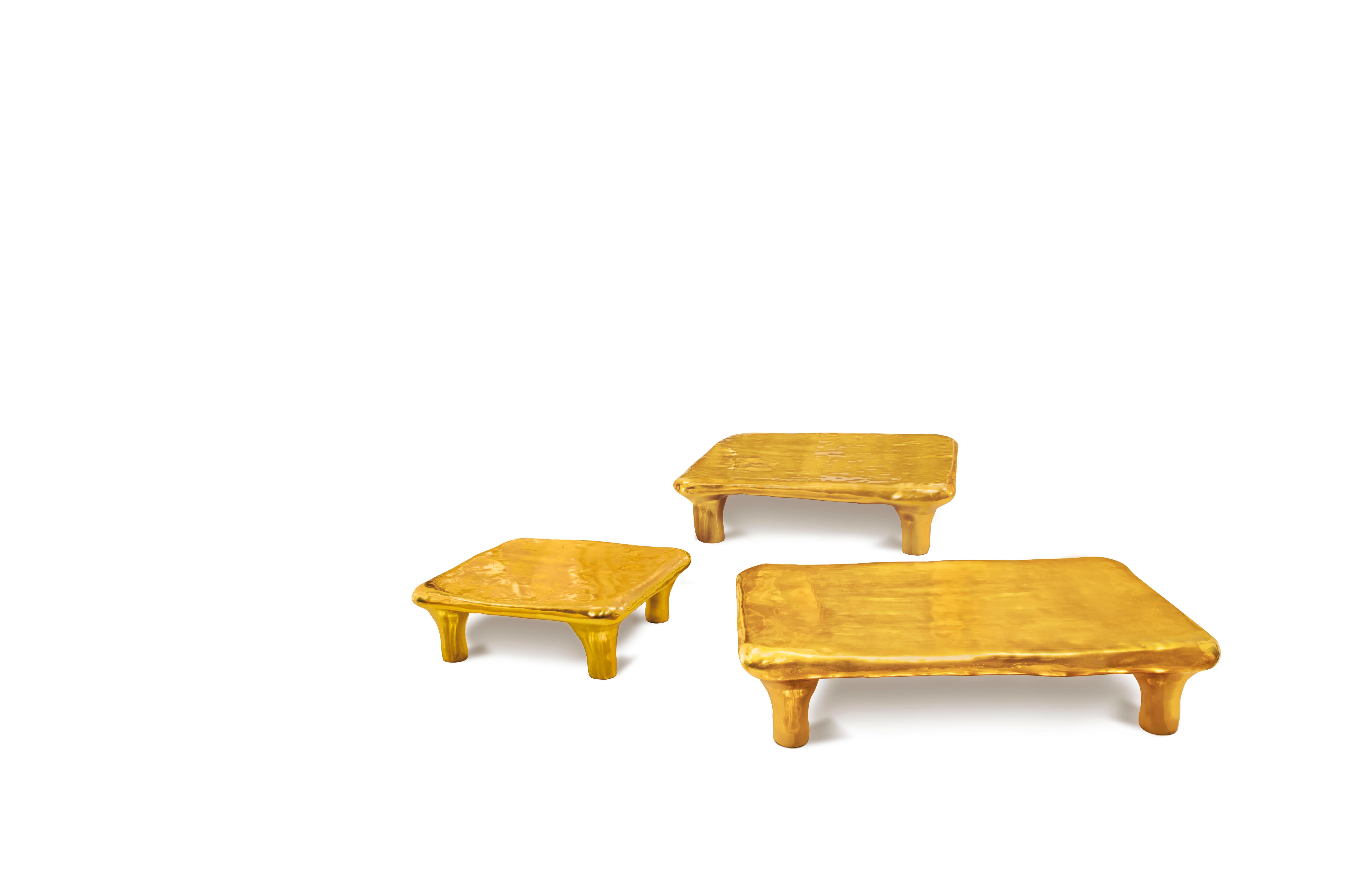Euphoria Coffee Table in Brass by Scarlet Splendour is a square coffee table.

The Fools' Gold collection of amorphous forms, cast in brass, is a tribute to the heritage of Indian metal craftsmanship. India, in fact, is one of the largest brass