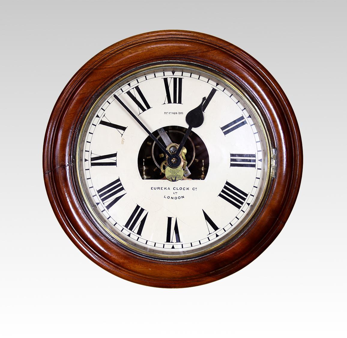 A superb example of a Eureka wall clock made c1911.

The electromagnetic movement is regulated by a large, slowly oscillating bi-metallic balance wheel, with the correct battery these clock will run for the duration of the battery life. Housed in a