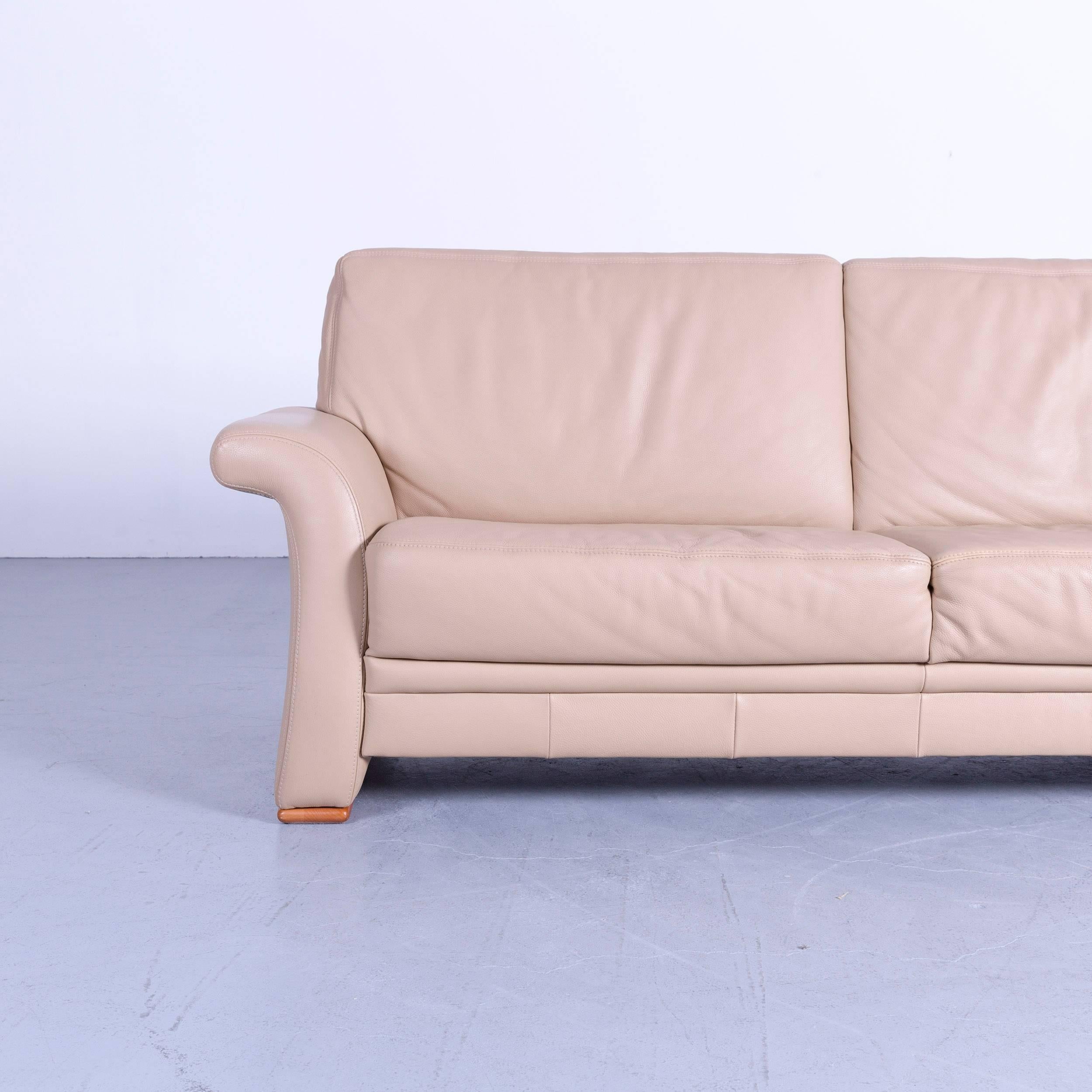 A super comfy Euri Collection sofa two-seat in beige color.