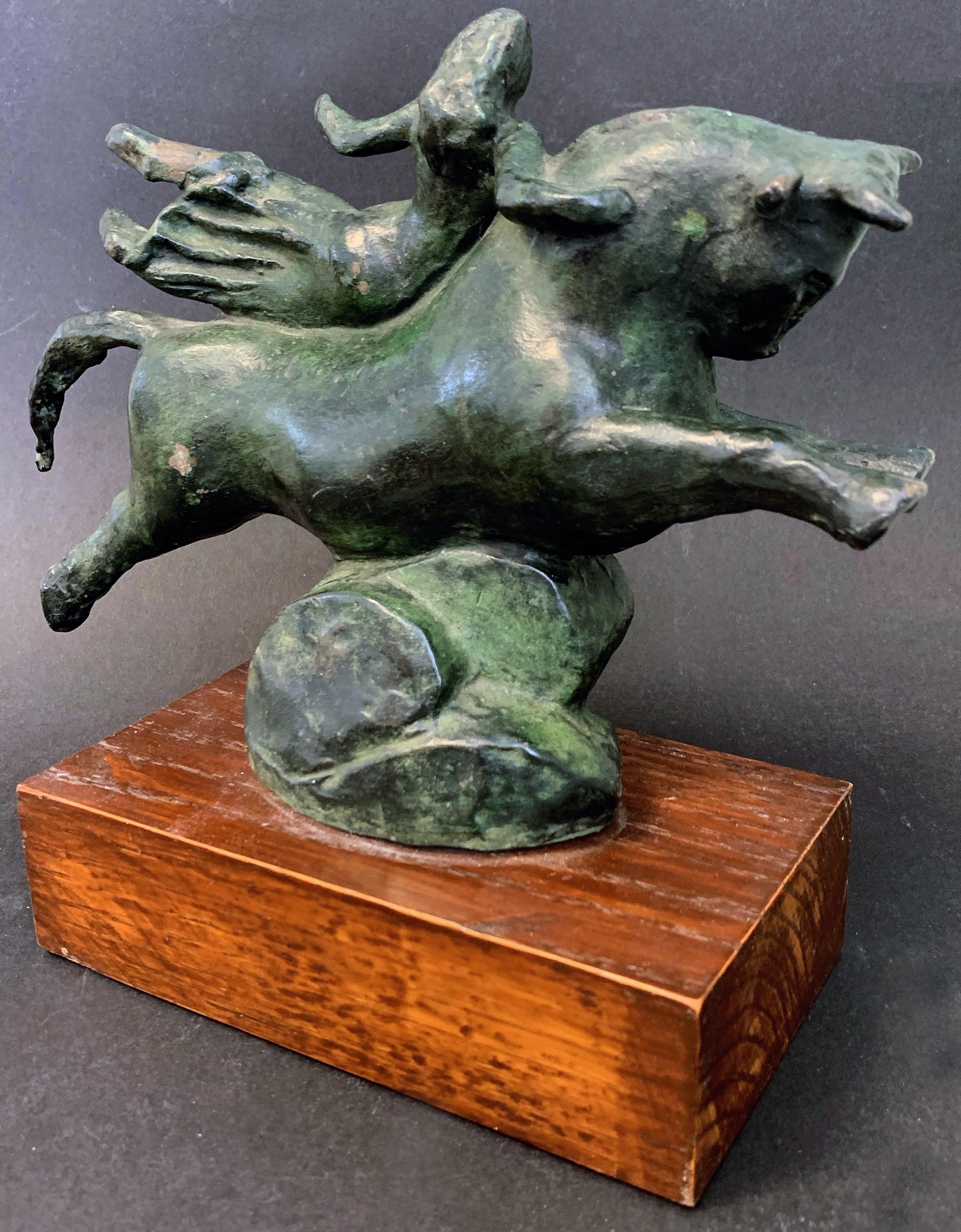 Charming and sophisticated, this bronze sculpture -- probably a maquette for a finished piece on a larger scale -- depicts a bull riding across the waves to Crete, with Europa on his back, her legs and skirt flowing behind, carried by the high