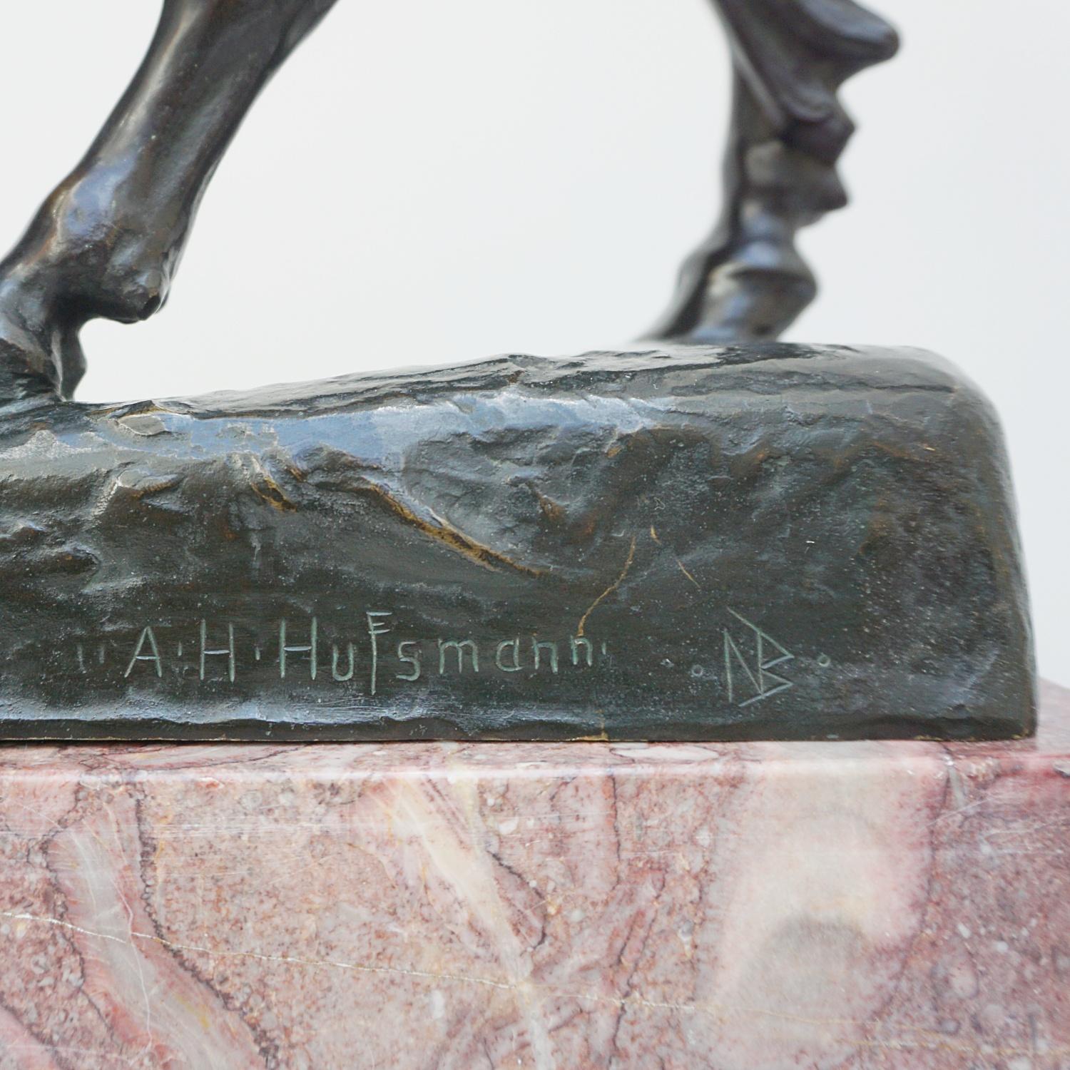 'Europa and the Bull' a large Art Deco bronze sculpture by Albert Hinrich Hussmann (1874-1946) of the Phoenician princess Europa riding the bull. Signed 'A.H.Hussmann' to bronze with W. Nurnberg Berlin 542 and NB Foundry stamp to bronze. Set over