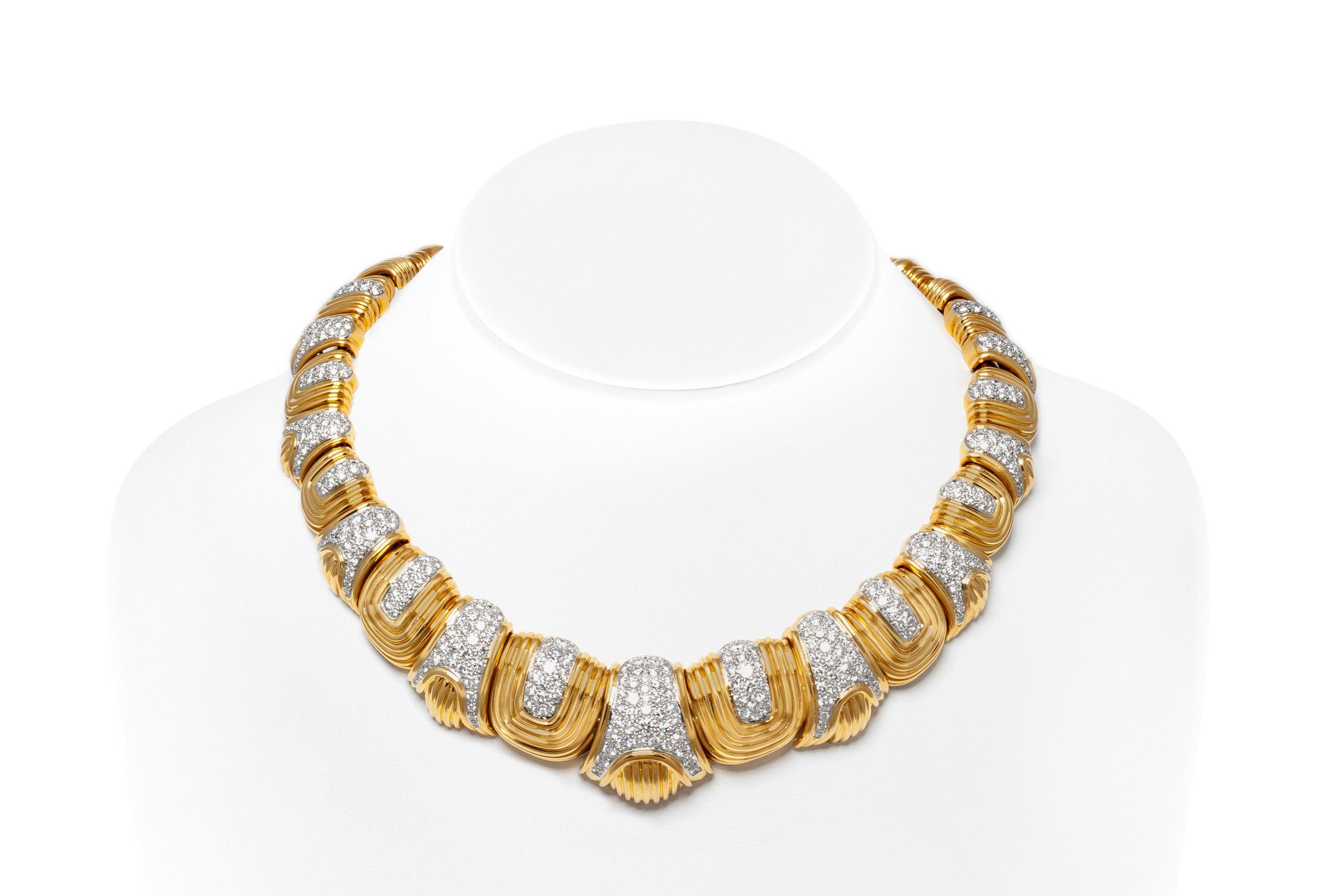 European choker necklace, finely crafted in 18k yellow gold with diamonds weighing approximately a total of 20.00 carats.