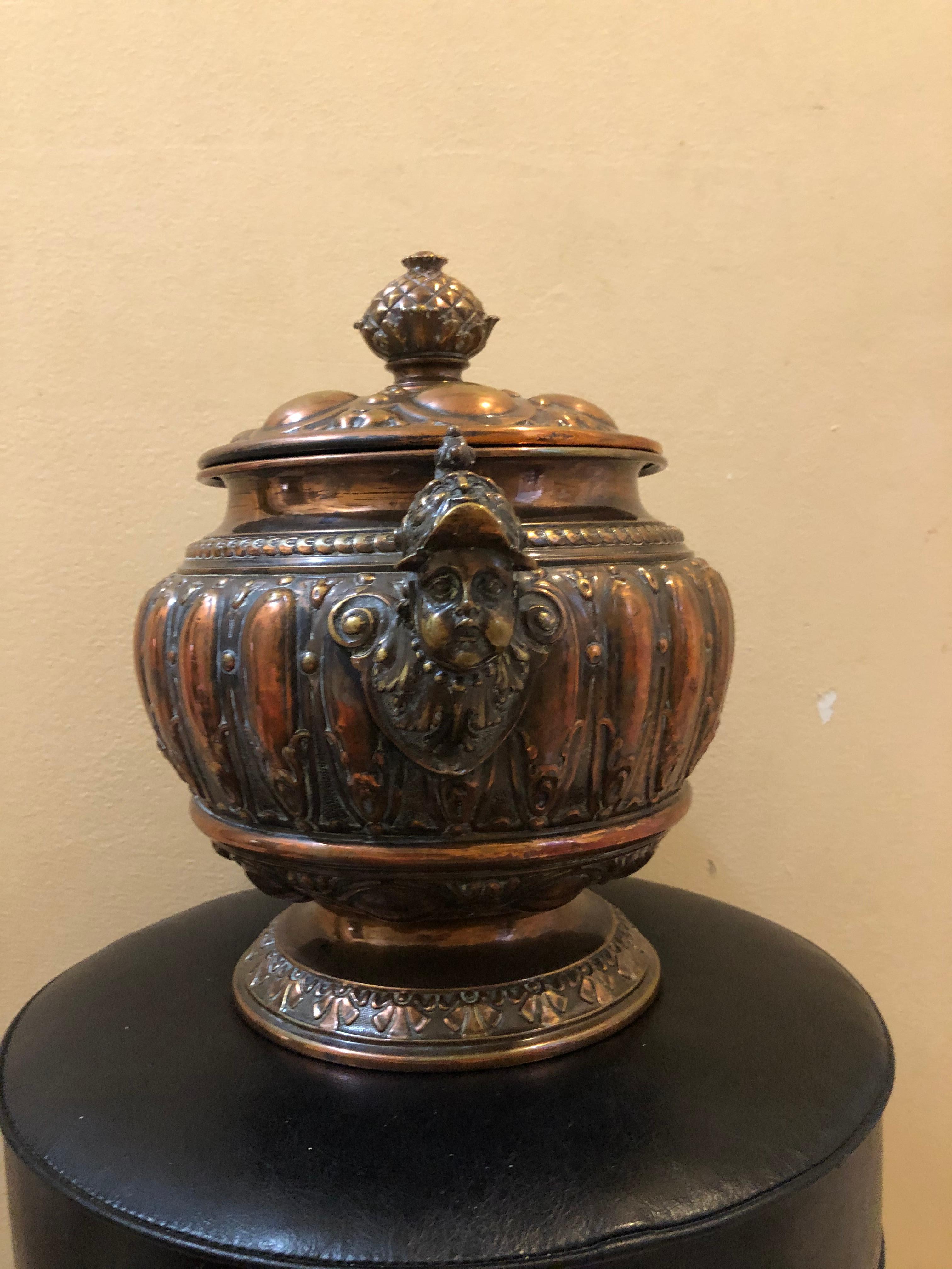 Incredible one of a kind repousse copper tureen. Most likely late 18th century or early 19th century. This fabulous hand-hammered piece is decorated with spectacular guard handles. This was obviously handmade for an extremely wealthy individual,